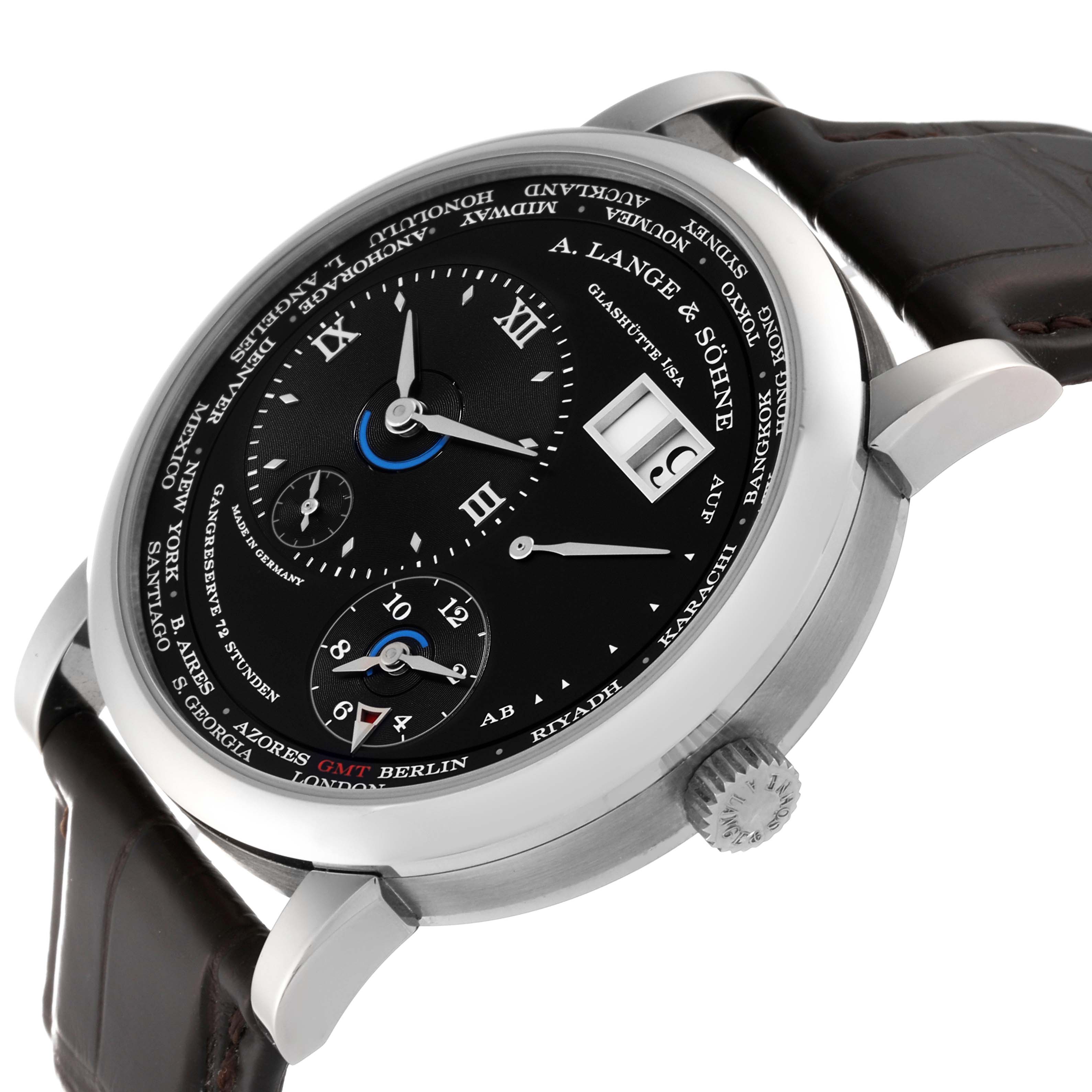 The image shows a close-up, angled view of the face and side crown of an A. Lange & Sohne Lange 1 136.029 Men's White Gold Black Dial watch.