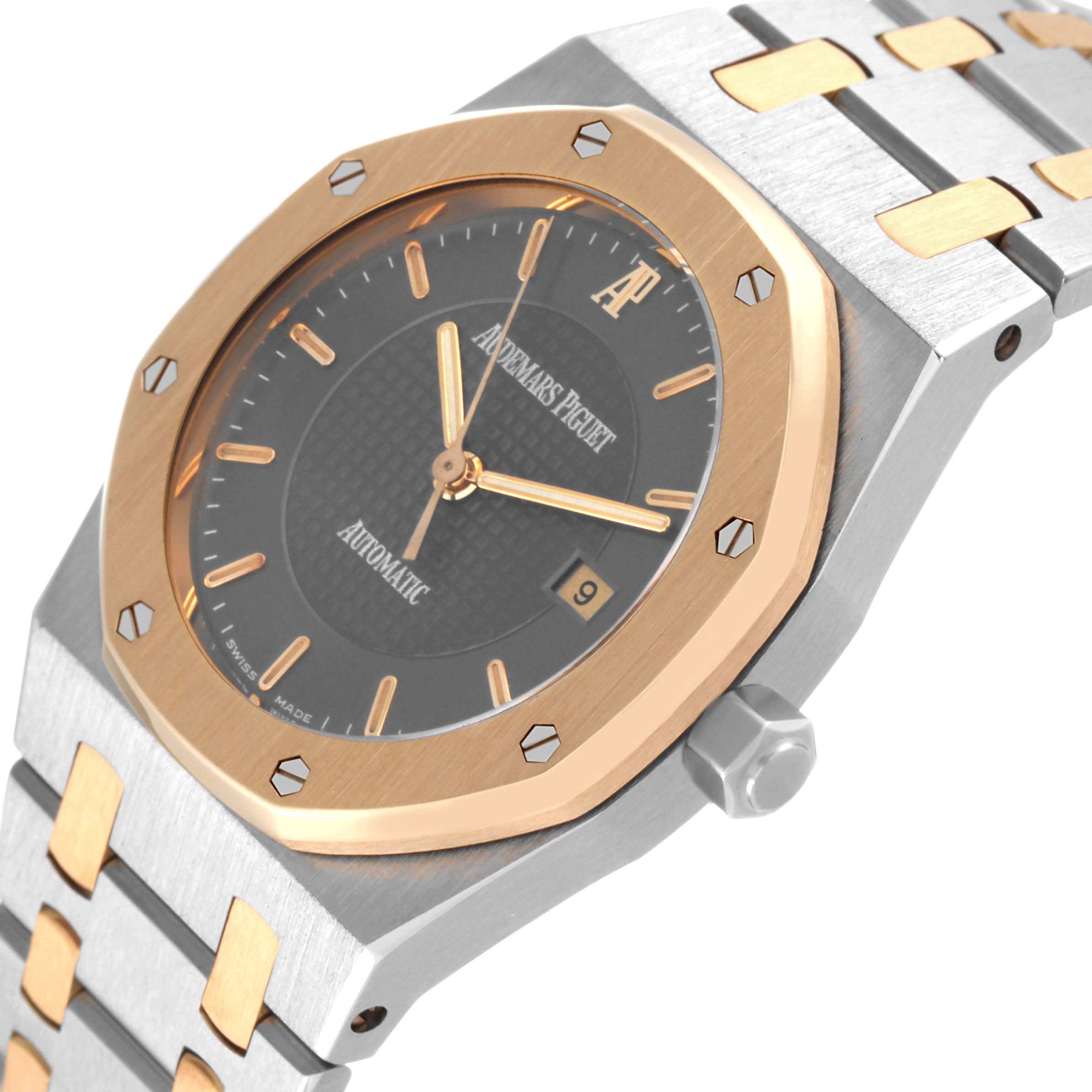 The image shows a close-up angled view of the Audemars Piguet Royal Oak 15050SA.O.0789SA.01 Men's Steel and Gold (two tone) Grey Dial 15050SA.O.0789SA.01 Men's Steel and Gold (two tone) Grey Dial watch, highlighting the bezel, dial, and part of the bracelet.