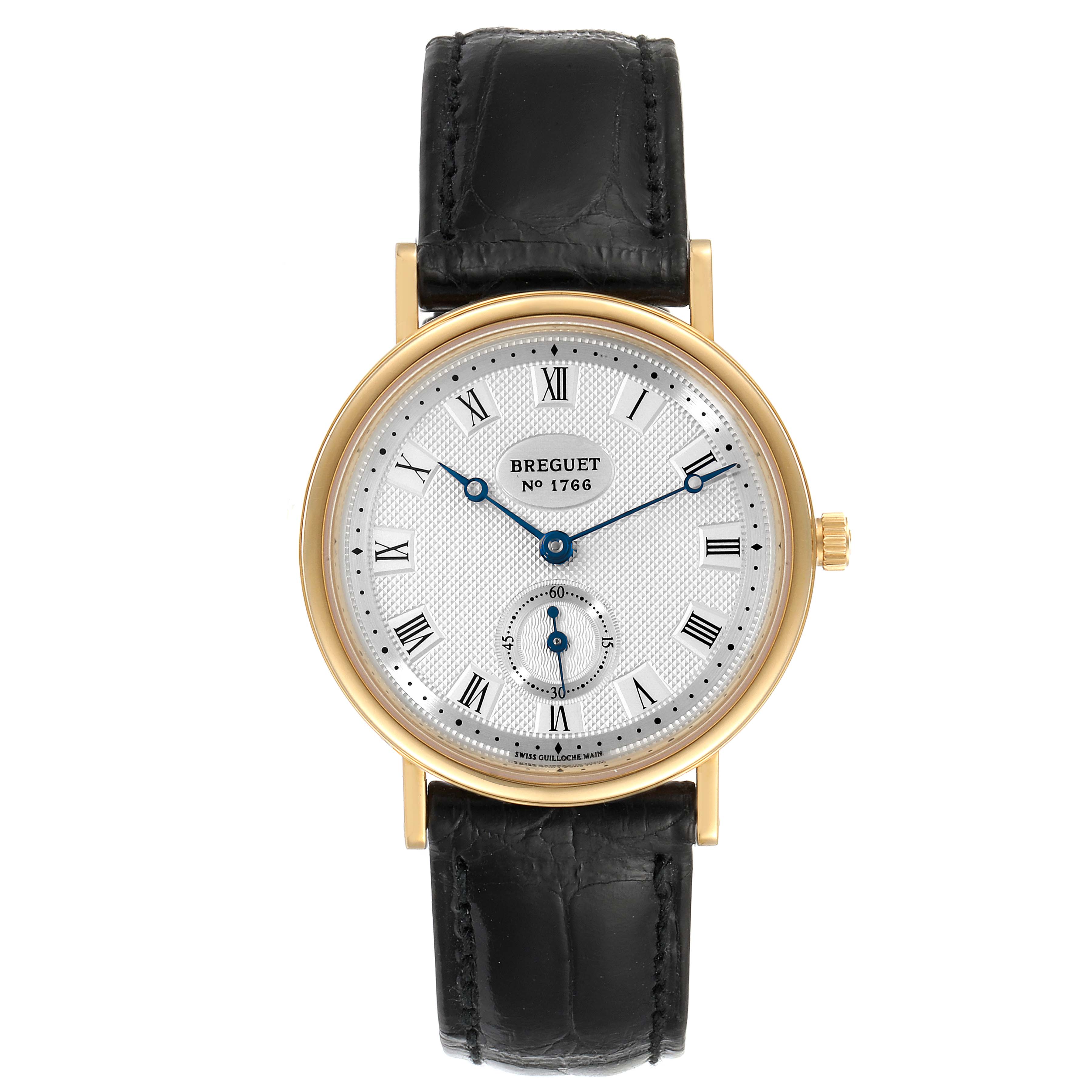 This image shows a frontal view of the Breguet Classique 3910BA/15/286 Men's Yellow Gold Silver Dial 3910BA/15/286 Men's Yellow Gold Silver Dial watch featuring a gold case, white dial with Roman numerals, and a black leather strap.