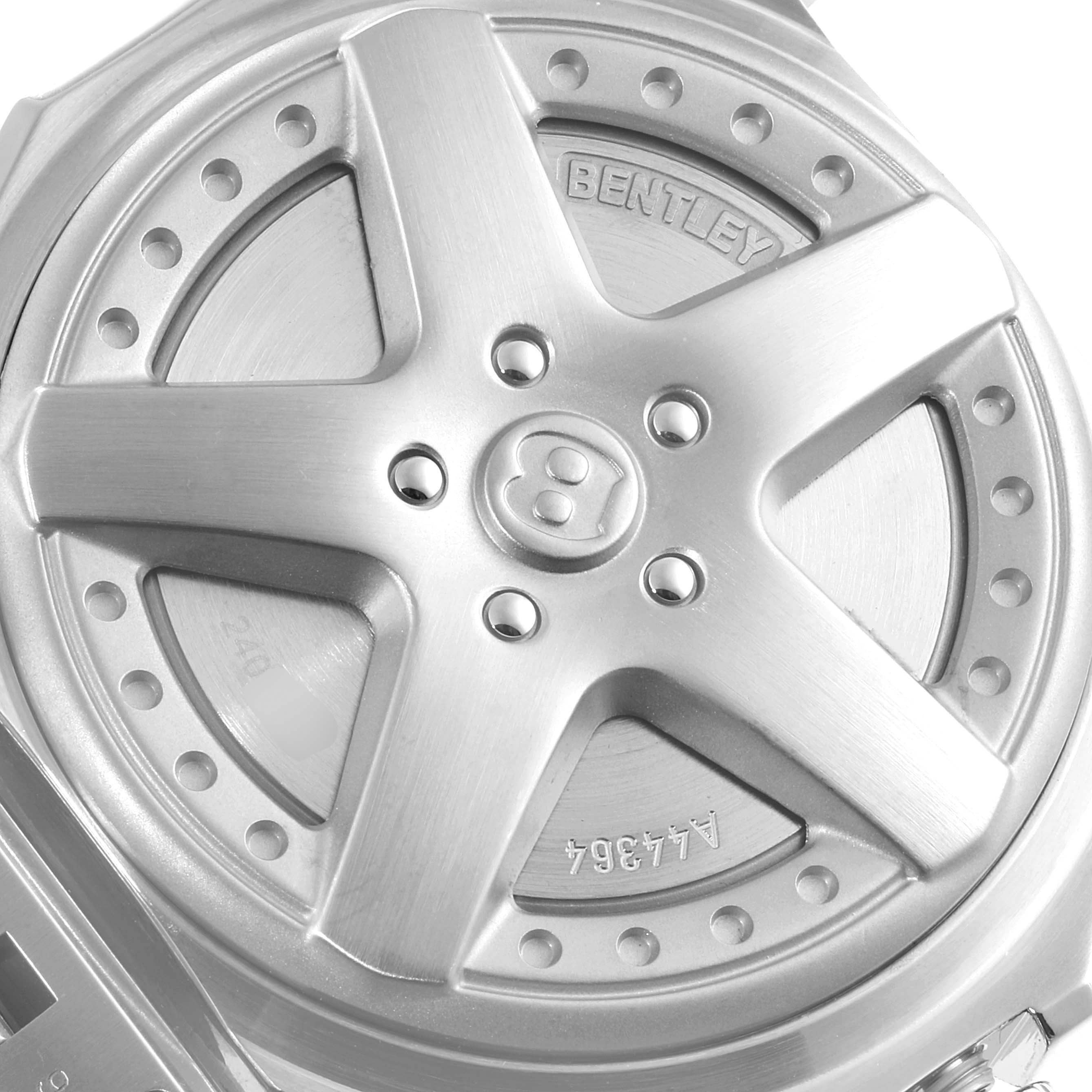 This image shows the back cover design of a Bentley model by Breitling, resembling a car wheel.