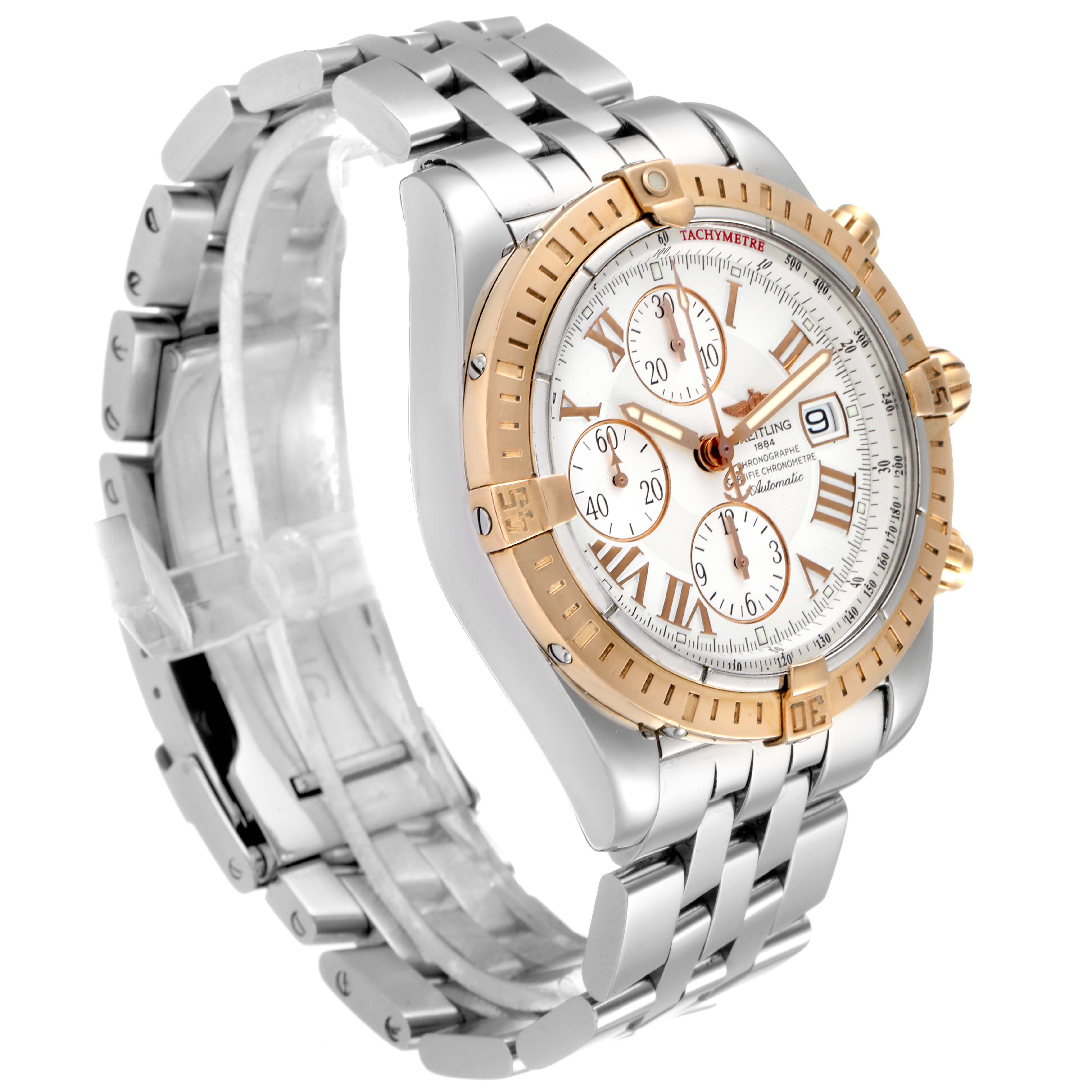 The Breitling Chronomat C13356 Men's Steel and Gold (two tone) White Dial C13356 Men's Steel and Gold (two tone) White Dial watch is shown at a 3/4 angle, highlighting its face, bezel, and steel bracelet.