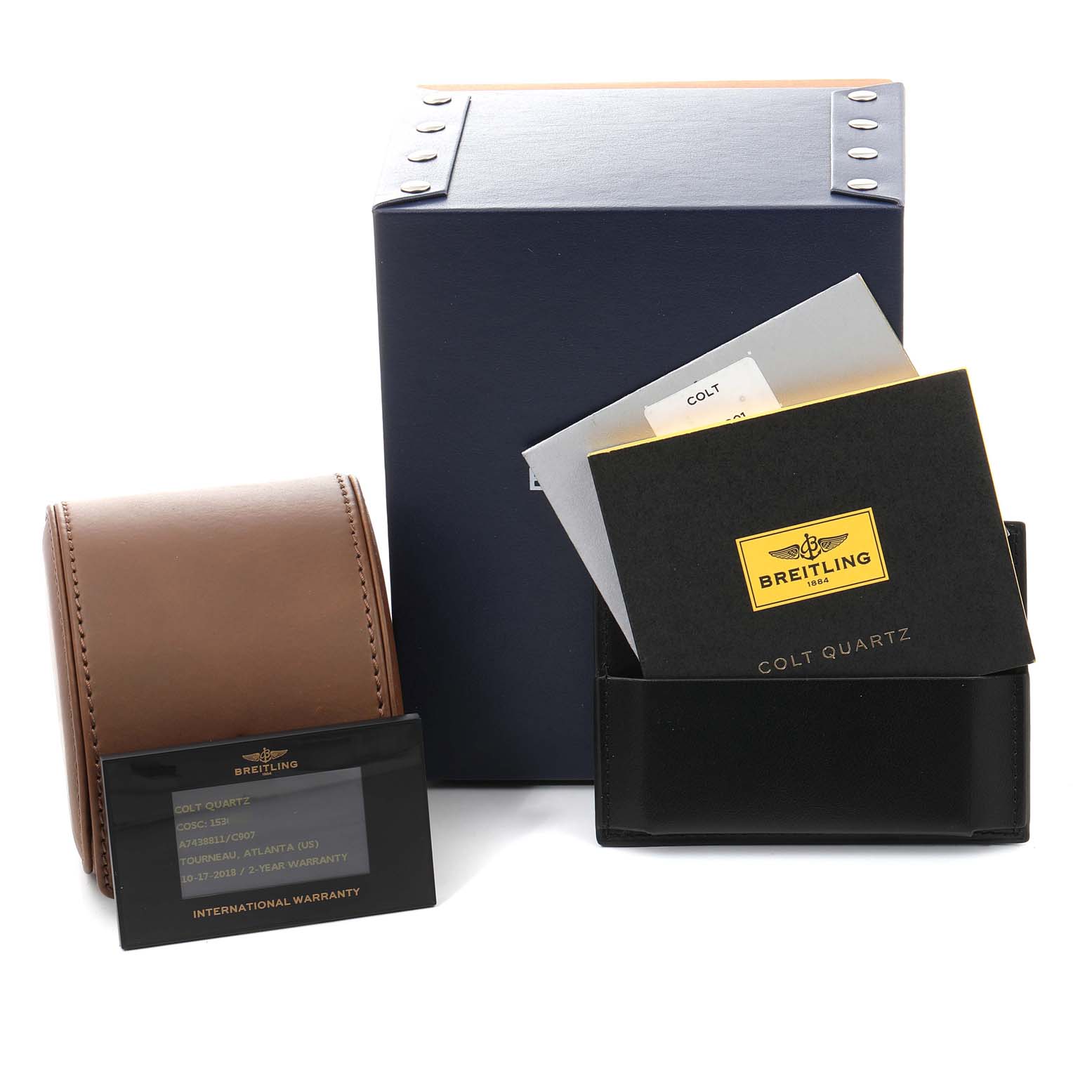 The image shows the box, warranty card, and leather pouch for the Breitling Colt A74388 Men's Stainless Steel Blue Dial A74388 Men's Stainless Steel Blue Dial model Quartz watch.