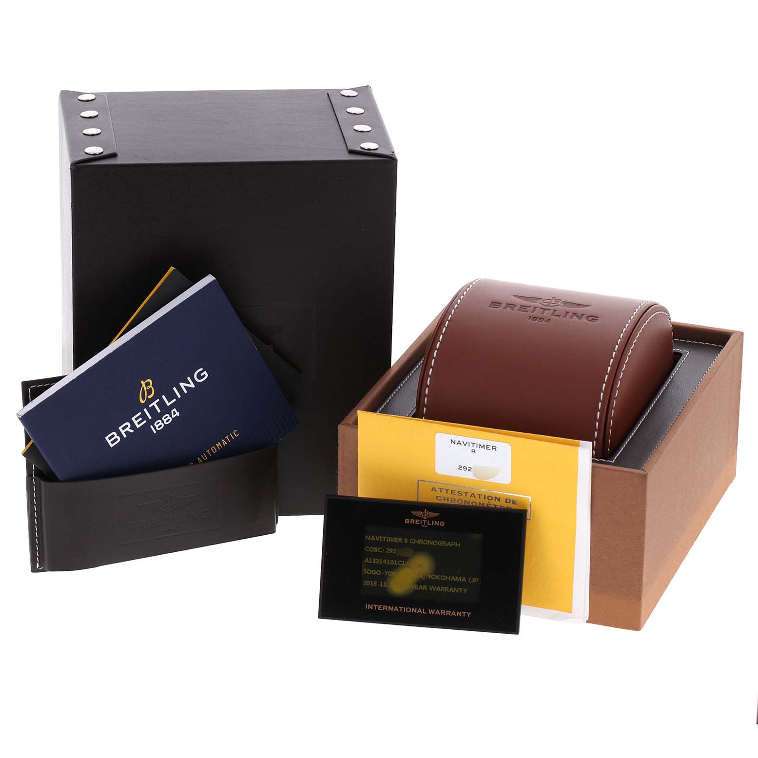 This image shows the packaging and accessories of a Breitling Navitimer A1331410/C997/189A Men
s Stainless Steel Blue Dial A1331410/C997/189A Men
s Stainless Steel Blue Dial watch, including its box, case, and documentation.