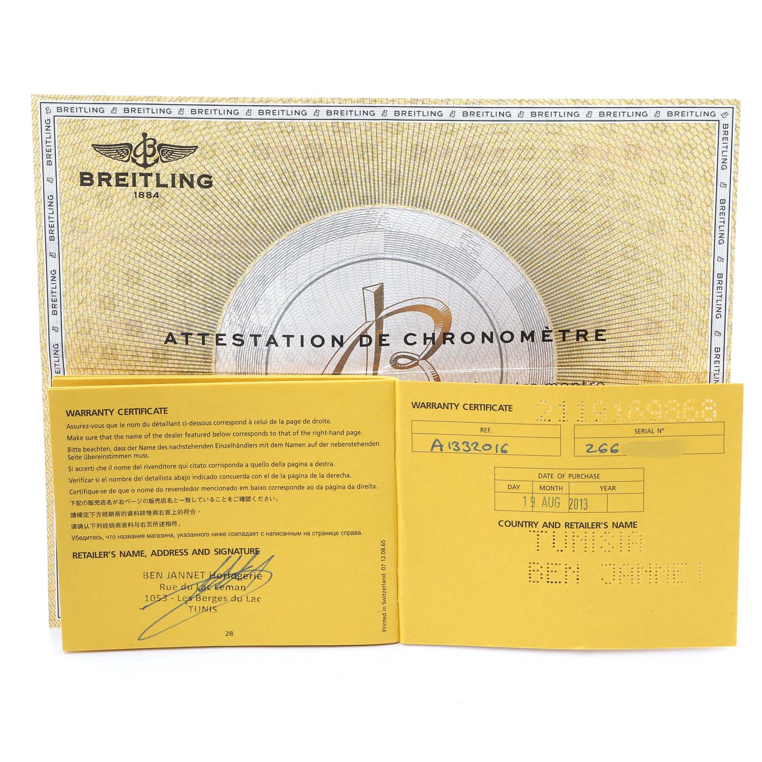 The image shows warranty certificates and an attestation document for the Breitling Superocean A13320 Men
s Stainless Steel Silver Dial A13320 Men
s Stainless Steel Silver Dial watch model.