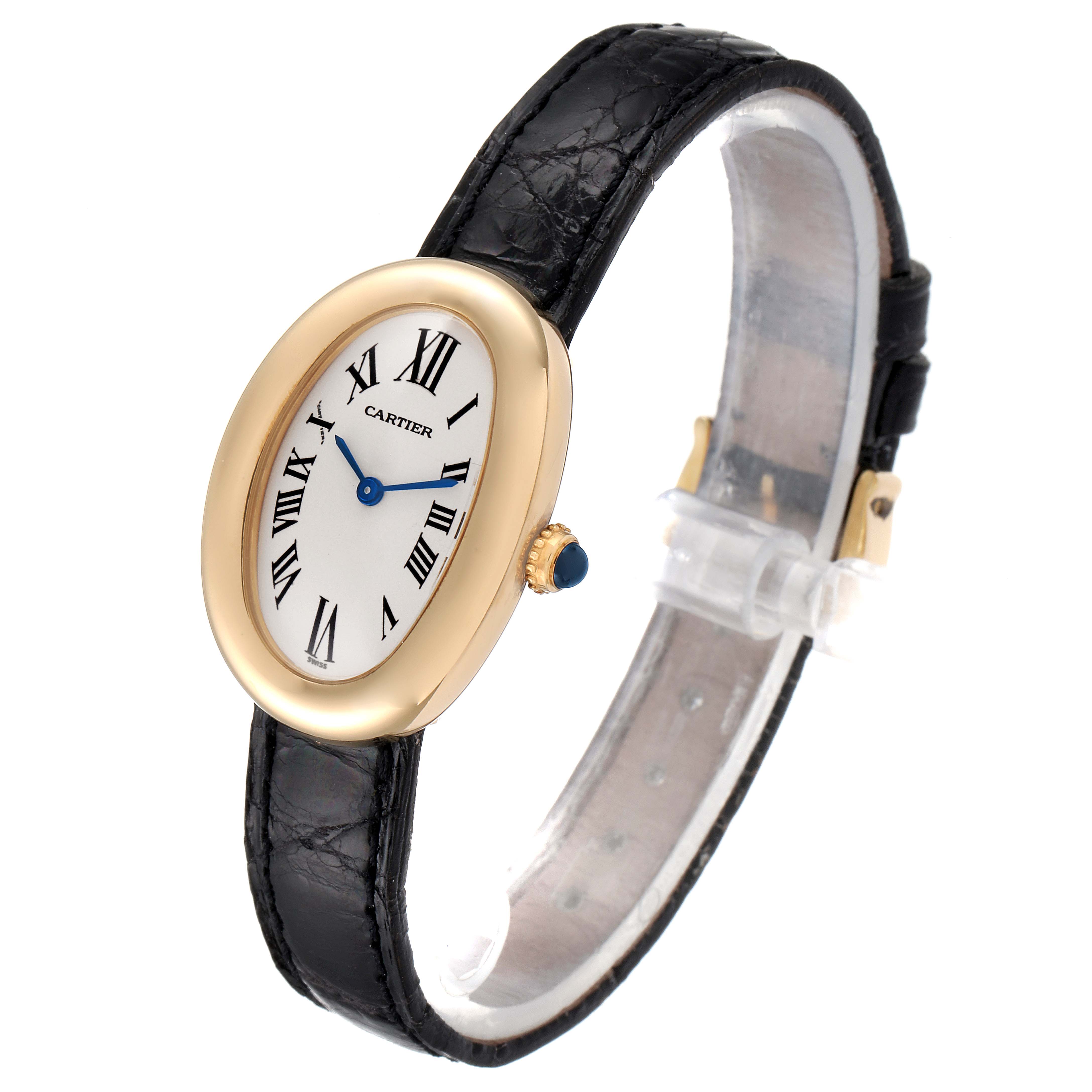 The Cartier Baignoire 1954 Women's Yellow Gold Silver Dial 1954 Women's Yellow Gold Silver Dial watch is shown at a slight front-side angle, highlighting its oval face, Roman numerals, and black leather strap.
