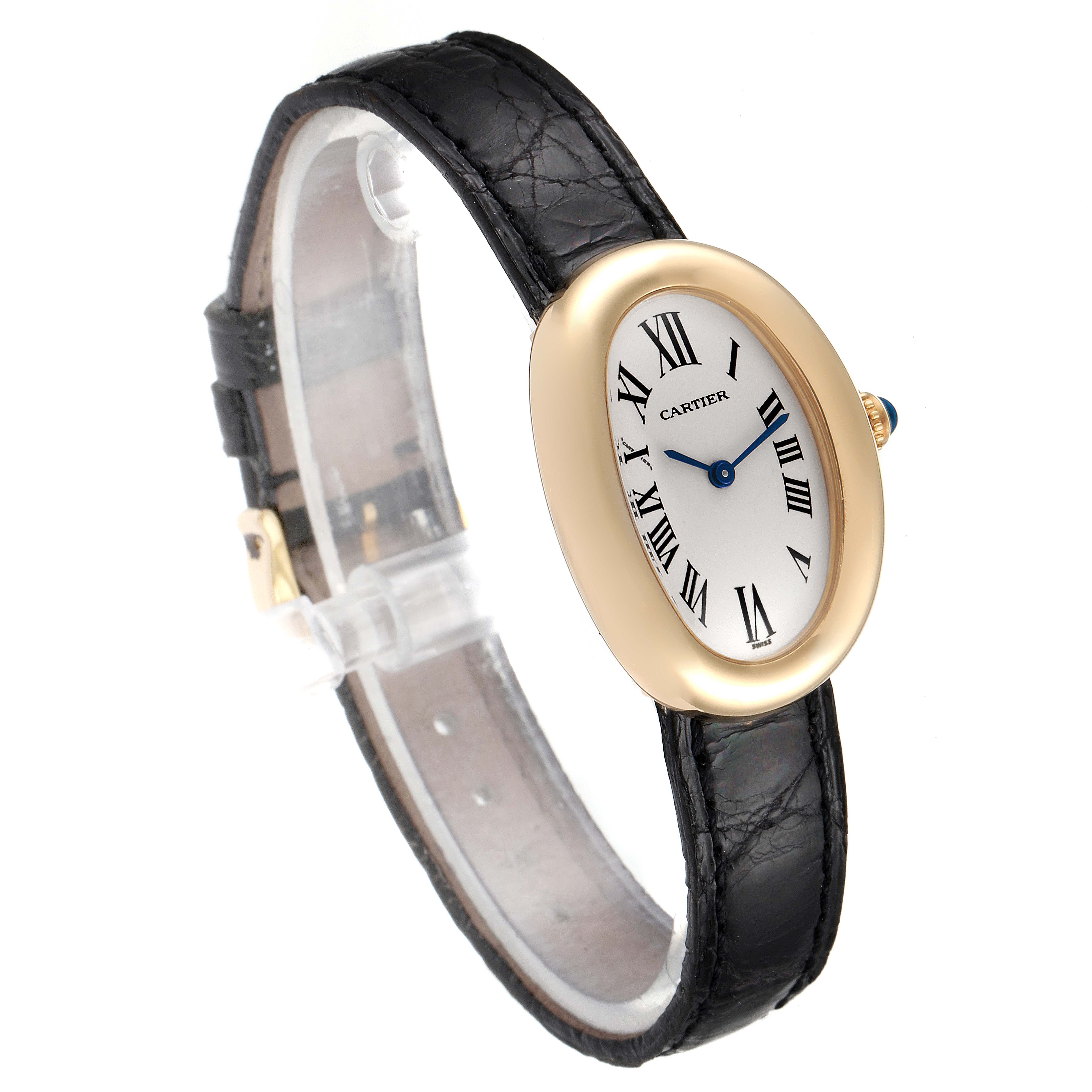 The image shows a Cartier Baignoire 1954 Women's Yellow Gold Silver Dial 1954 Women's Yellow Gold Silver Dial watch at a three-quarter angle, highlighting its oval dial, Roman numerals, and black leather strap.