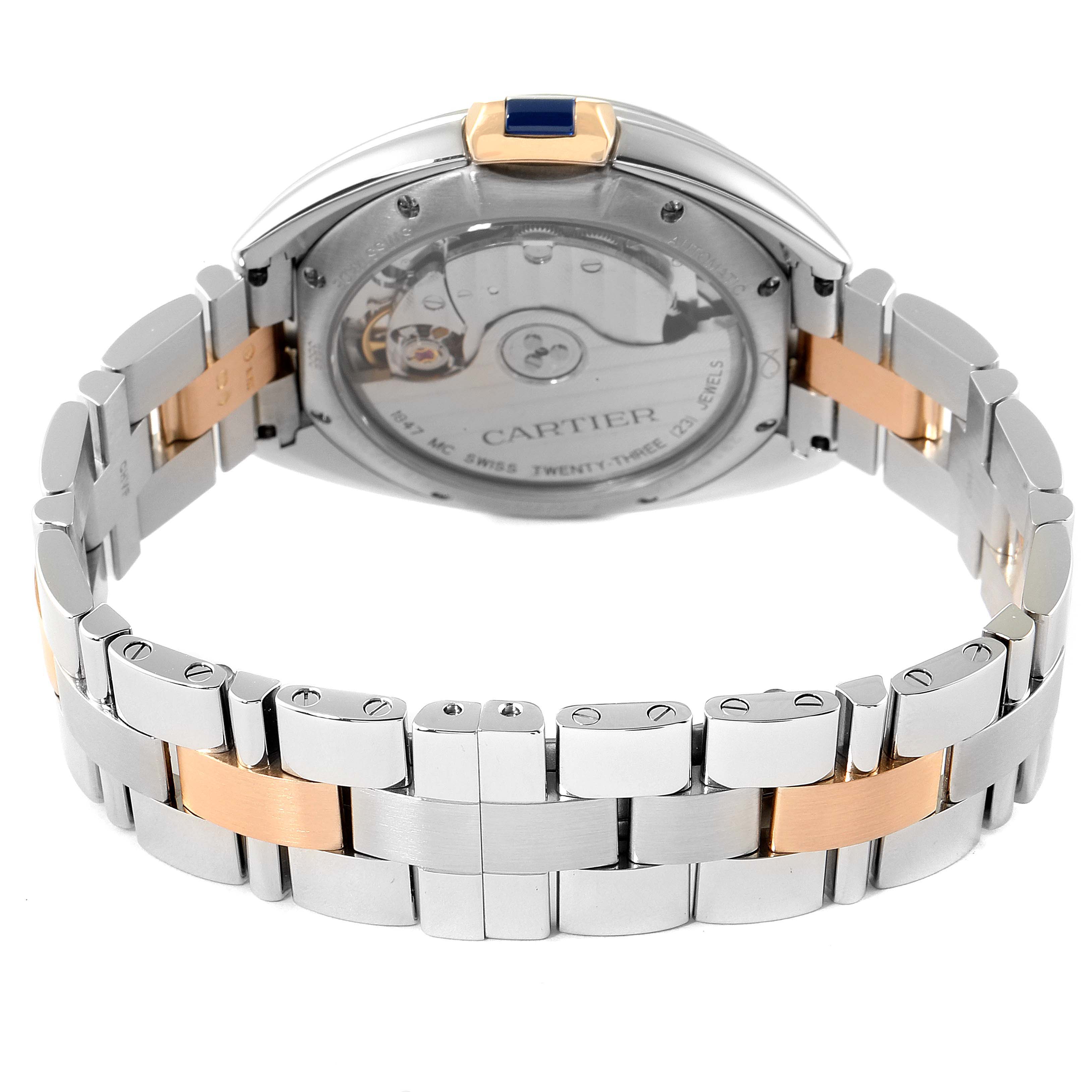 This image shows the back view of the Cartier Cle W2CL0003 Women
s Steel and Gold (two tone) Silver Dial W2CL0003 Women
s Steel and Gold (two tone) Silver Dial model watch, highlighting its bracelet and the movement through the transparent case back.