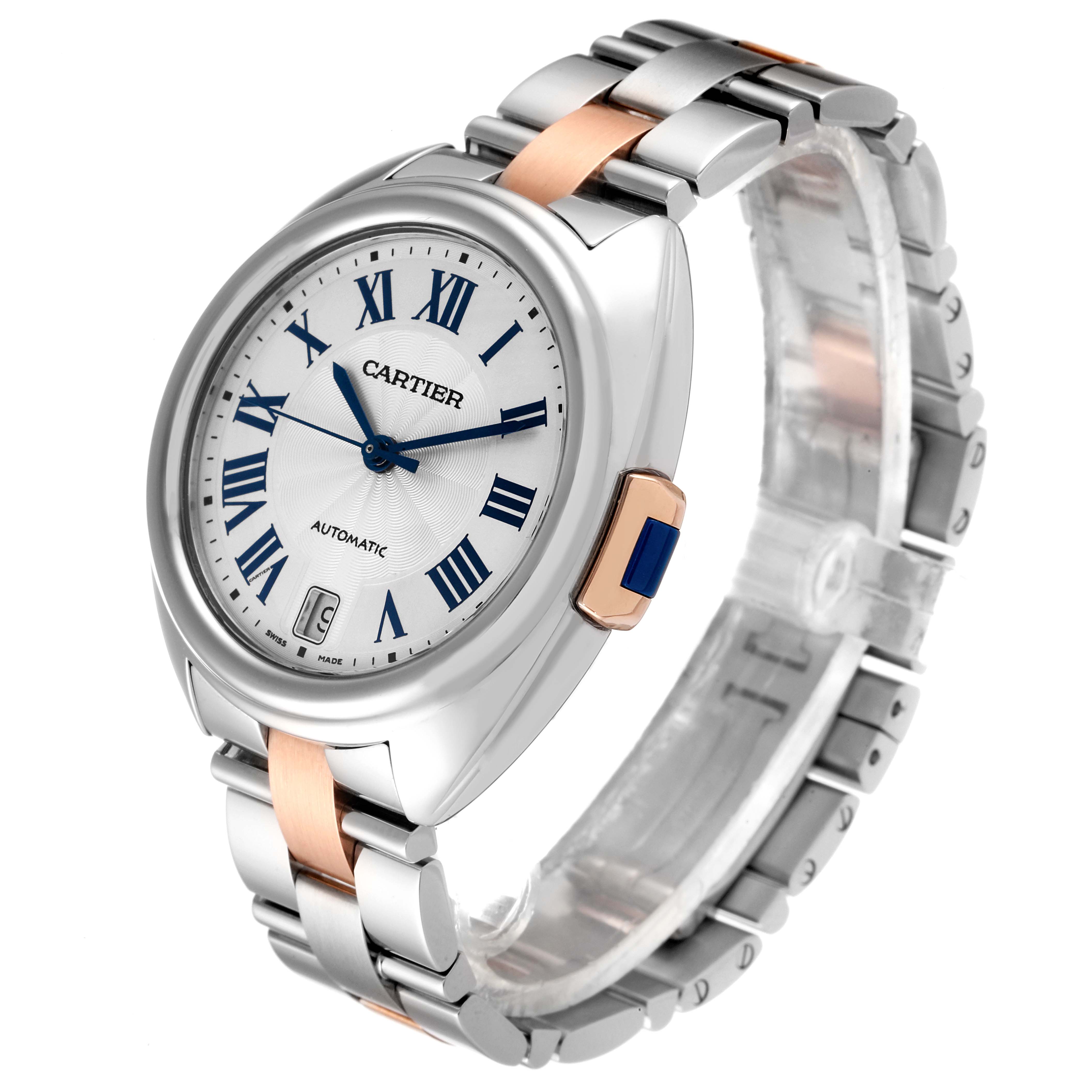 The Cartier Clé model watch is shown from a three-quarter angle, highlighting its dial, bracelet, and case.