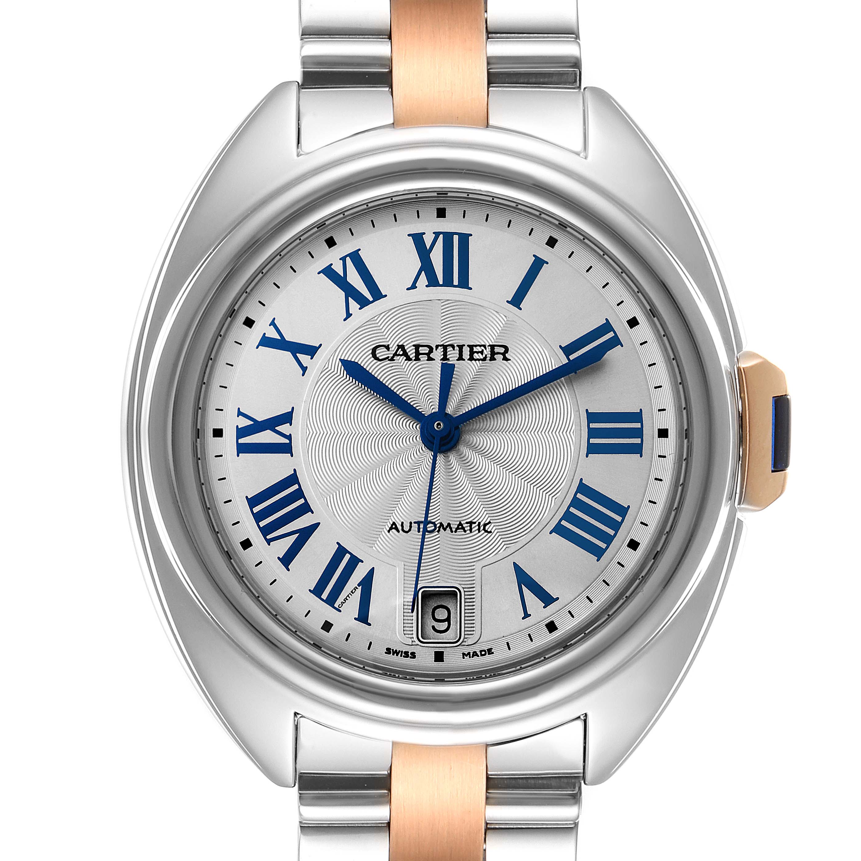 The image shows a front view of a Cartier Cle W2CL0003 Women
s Steel and Gold (two tone) Silver Dial W2CL0003 Women
s Steel and Gold (two tone) Silver Dial model watch, displaying the dial, hands, crown, and part of the bracelet.