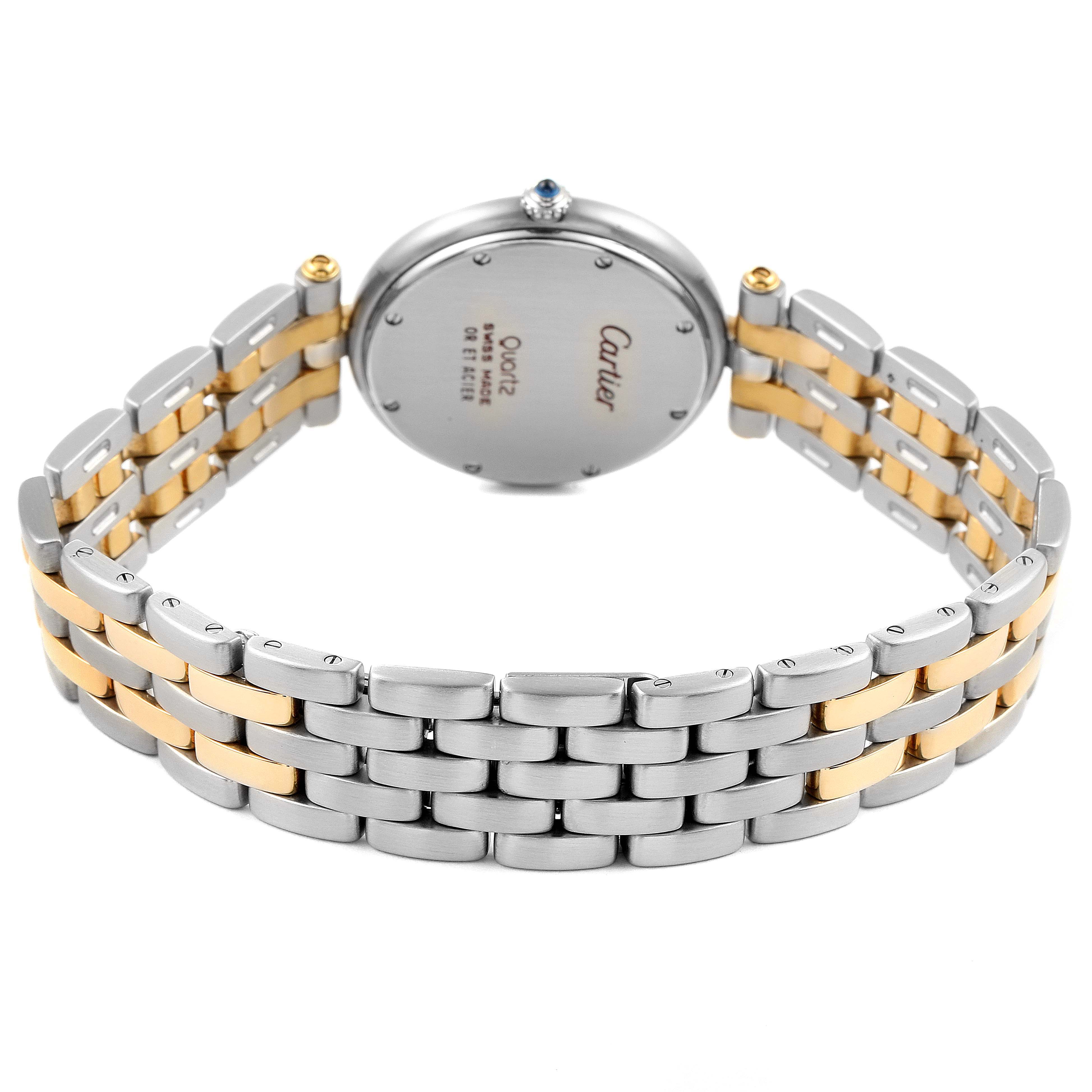 The image shows the back view of a Panthere model by Cartier, focusing on the case back and two-tone bracelet.