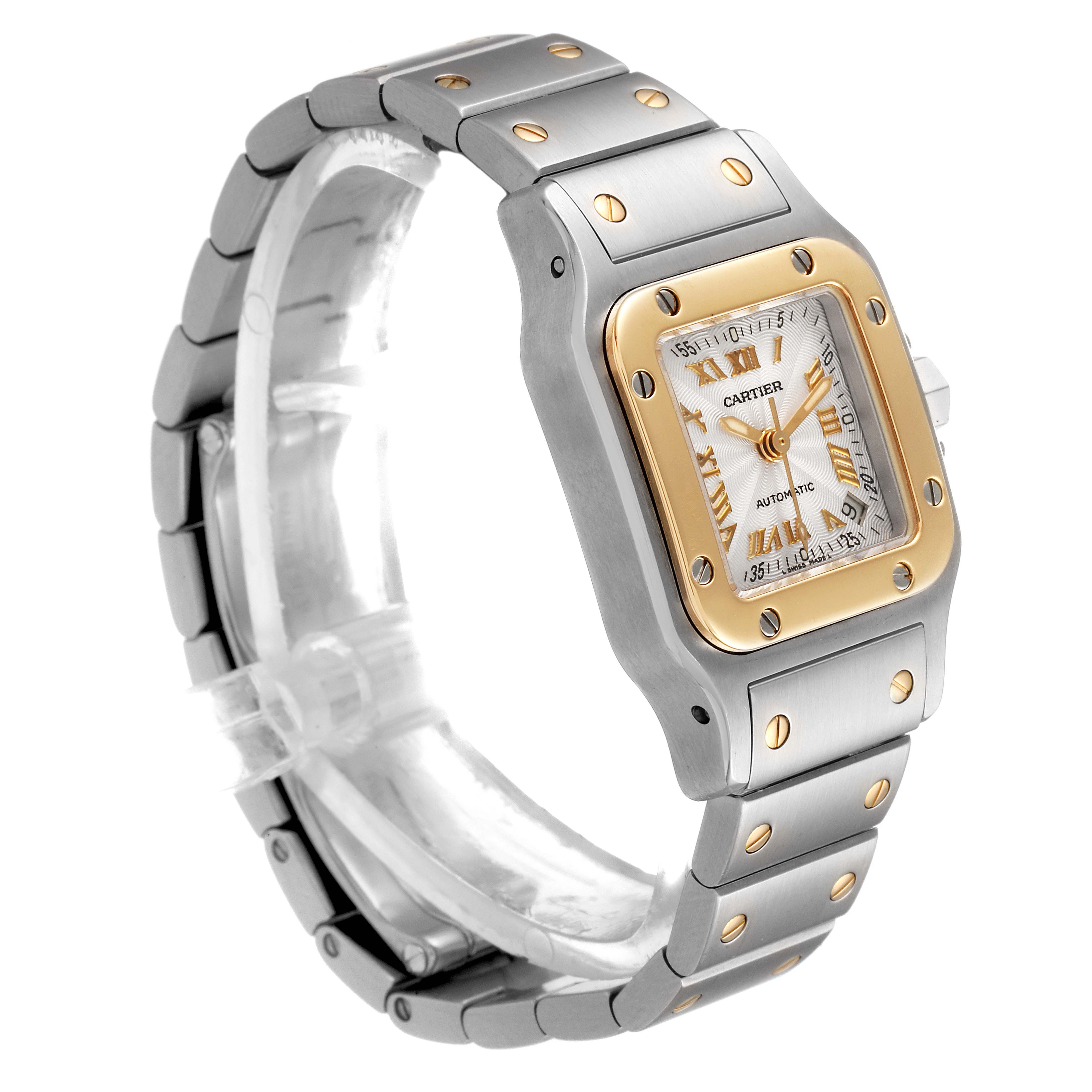 The Cartier Santos W20057C4 Women's Steel and Gold (two tone) Silver Dial W20057C4 Women's Steel and Gold (two tone) Silver Dial model watch is shown at a slight angle, displaying the face, bezel, and part of the band.