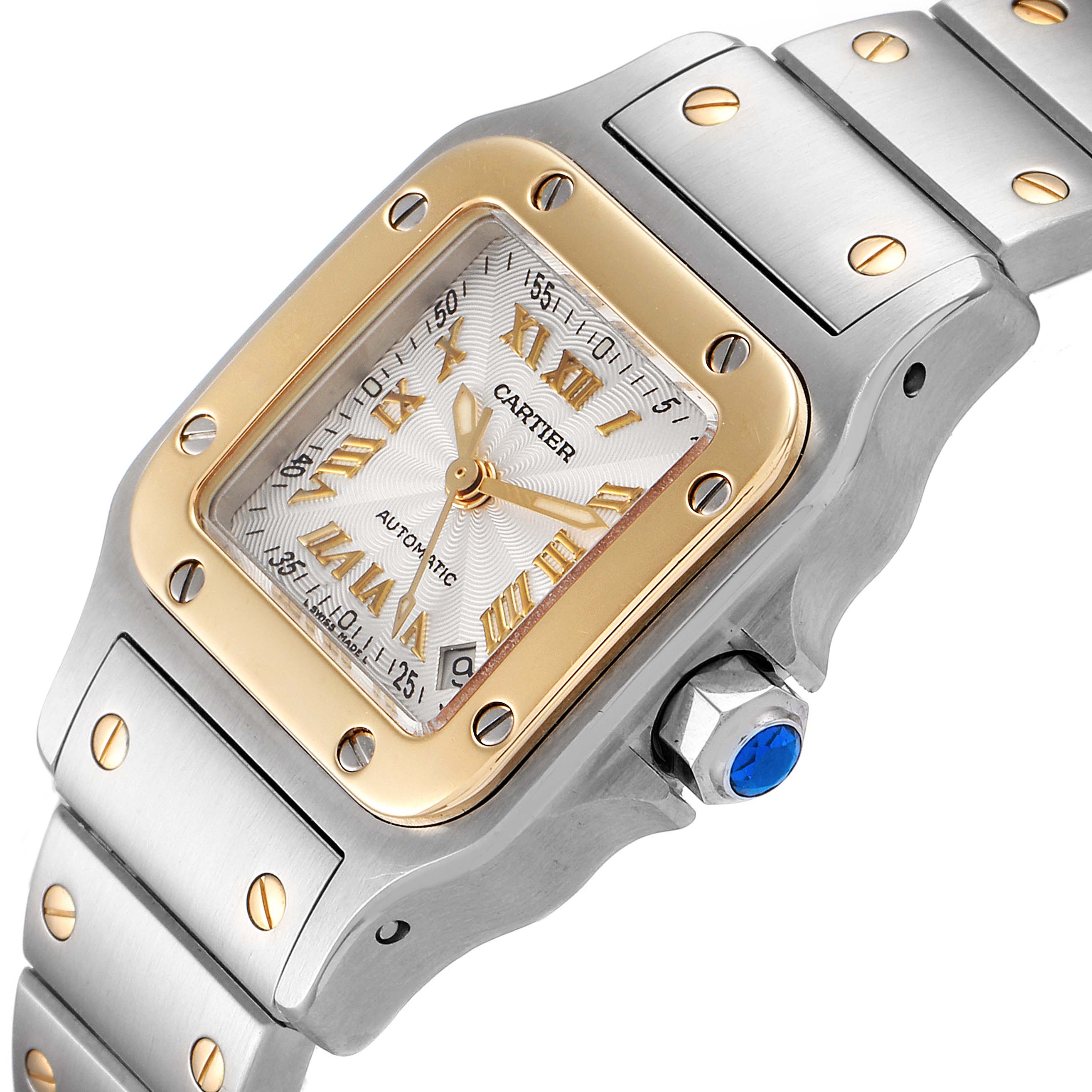 The image shows a close-up of a Santos model watch by Cartier from an angled top view, highlighting the bezel, dial, bracelet, and crown.