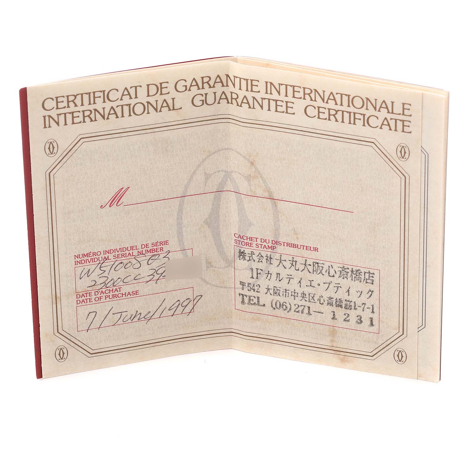 The image shows the opened international guarantee certificate for the Cartier Tank Francaise W51008Q3 Women's Stainless Steel Silver Dial W51008Q3 Women's Stainless Steel Silver Dial watch.