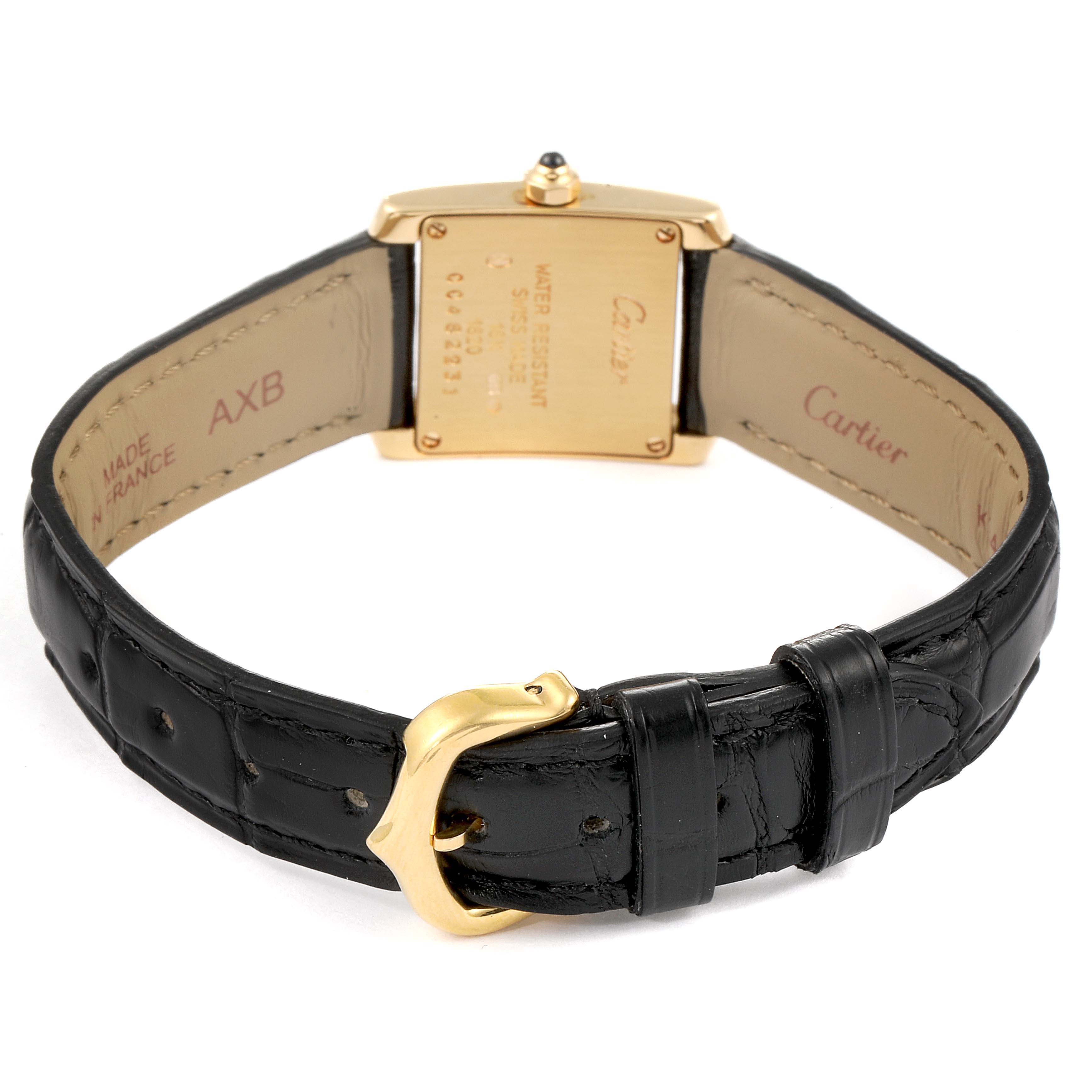 This image shows the back of a Cartier Tank Francaise W5000256 Women's Yellow Gold Silver Dial W5000256 Women's Yellow Gold Silver Dial watch, highlighting the case back, strap, and buckle.