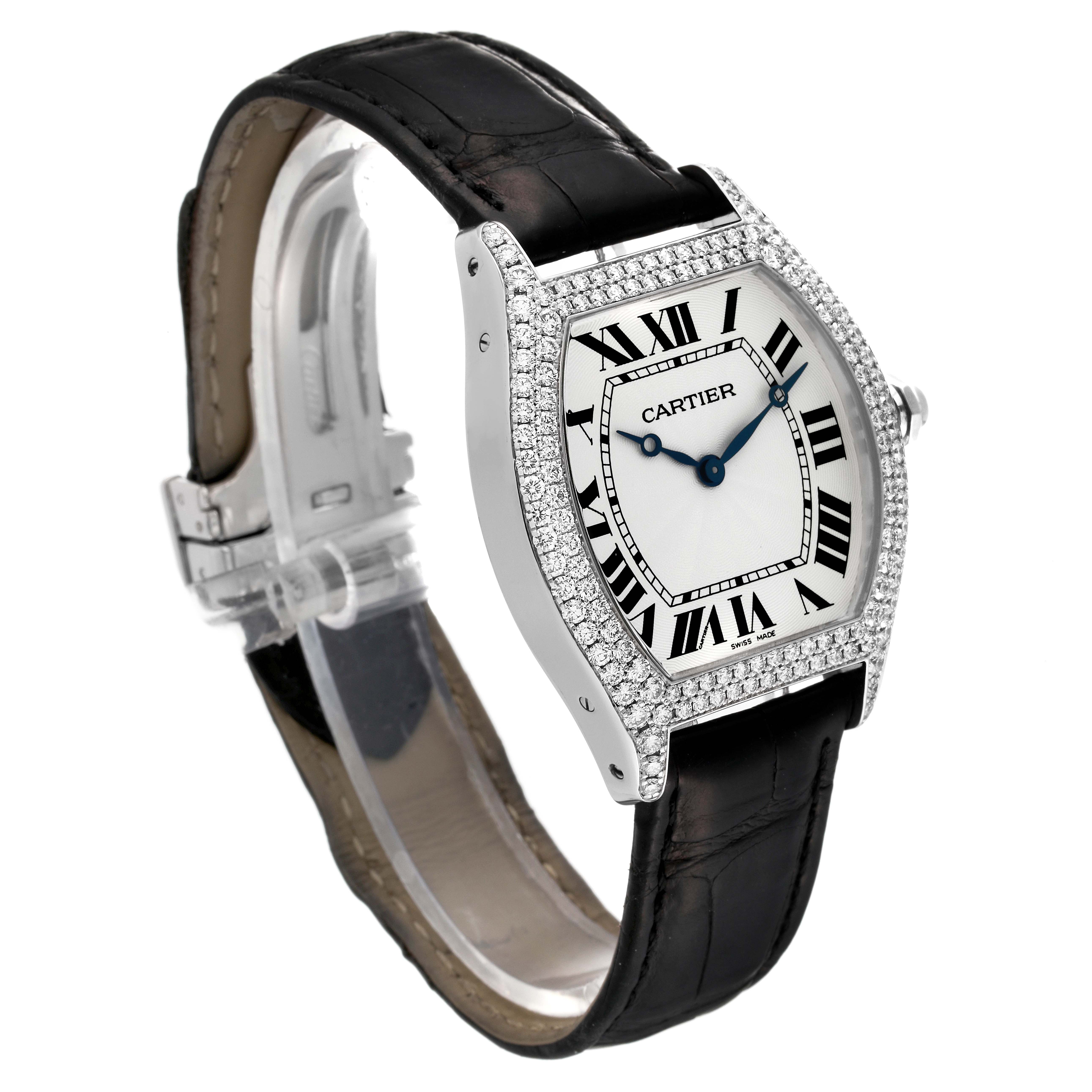 The Cartier Tortue WA503851 Men
s White Gold Silver Dial WA503851 Men
s White Gold Silver Dial watch is shown at a slight angle, displaying the dial, bezel encrusted with diamonds, and the leather strap.