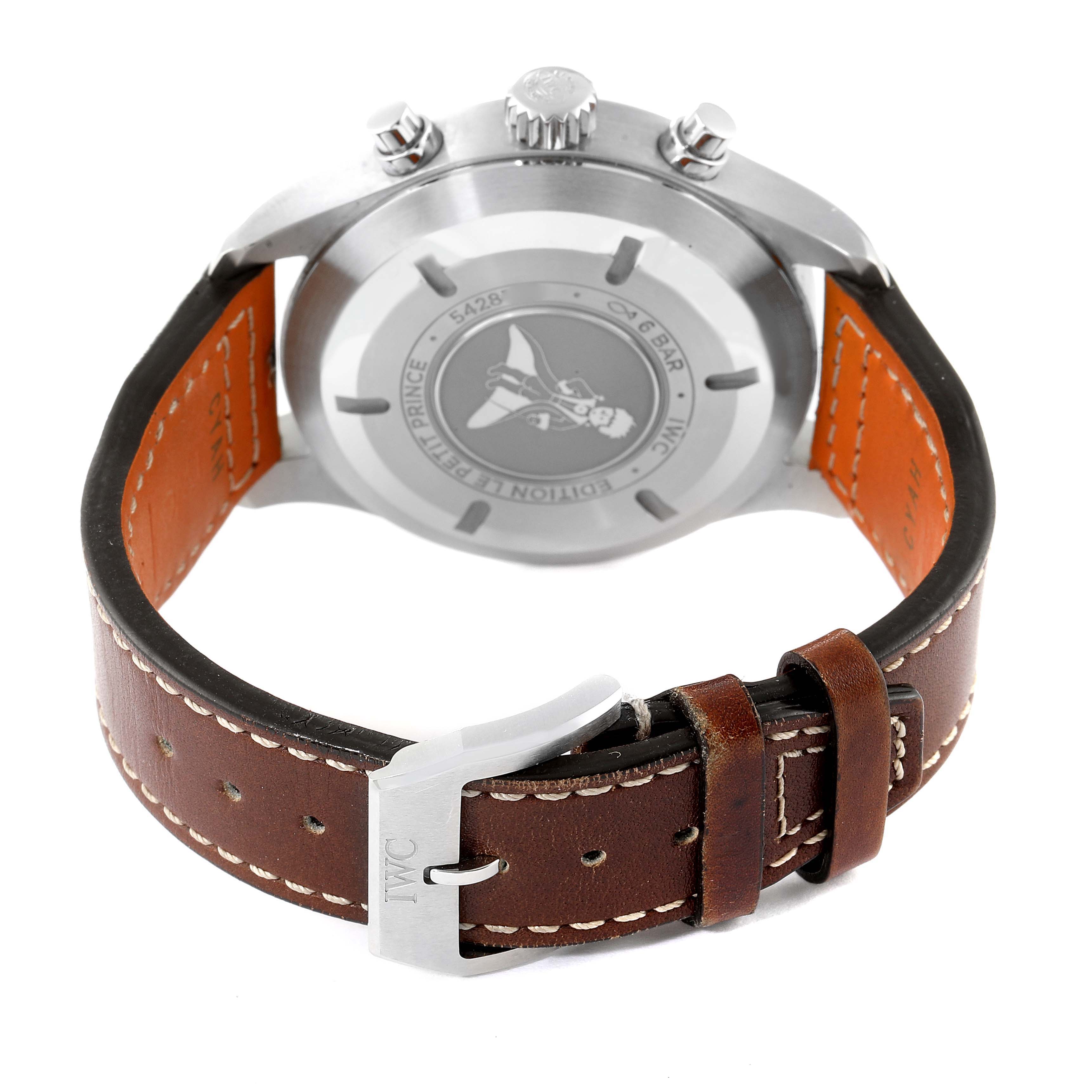 The image shows the back view of an IWC Pilot IW377714 Men's Stainless Steel Blue Dial IW377714 Men's Stainless Steel Blue Dial model watch, featuring its case back and brown leather strap with a buckle.