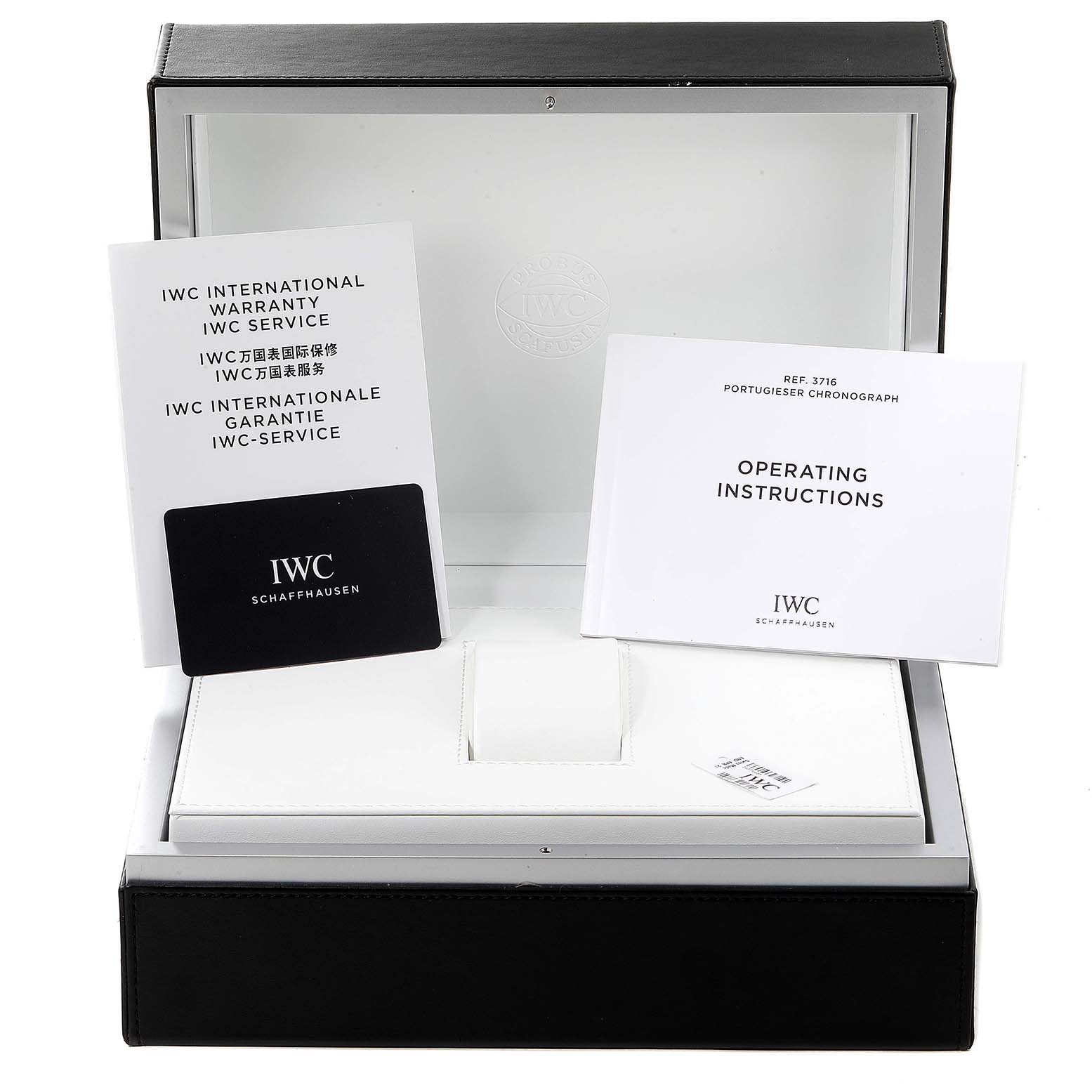 The image shows the IWC Portuguese IW371605 Men's Stainless Steel Silver Dial IW371605 Men's Stainless Steel Silver Dial model box, warranty booklet, and operating instructions from a frontal angle.