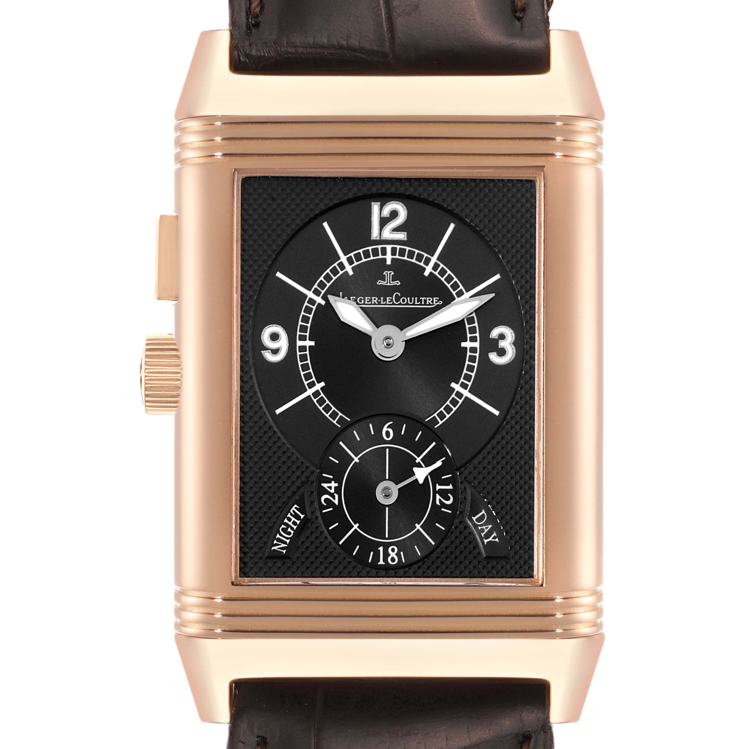 The Jaeger LeCoultre Reverso Q2712410 Men's Rose Gold Silver Dial Q2712410 Men's Rose Gold Silver Dial watch is shown from the front, displaying its dial, hands, and day-night sub-dial.