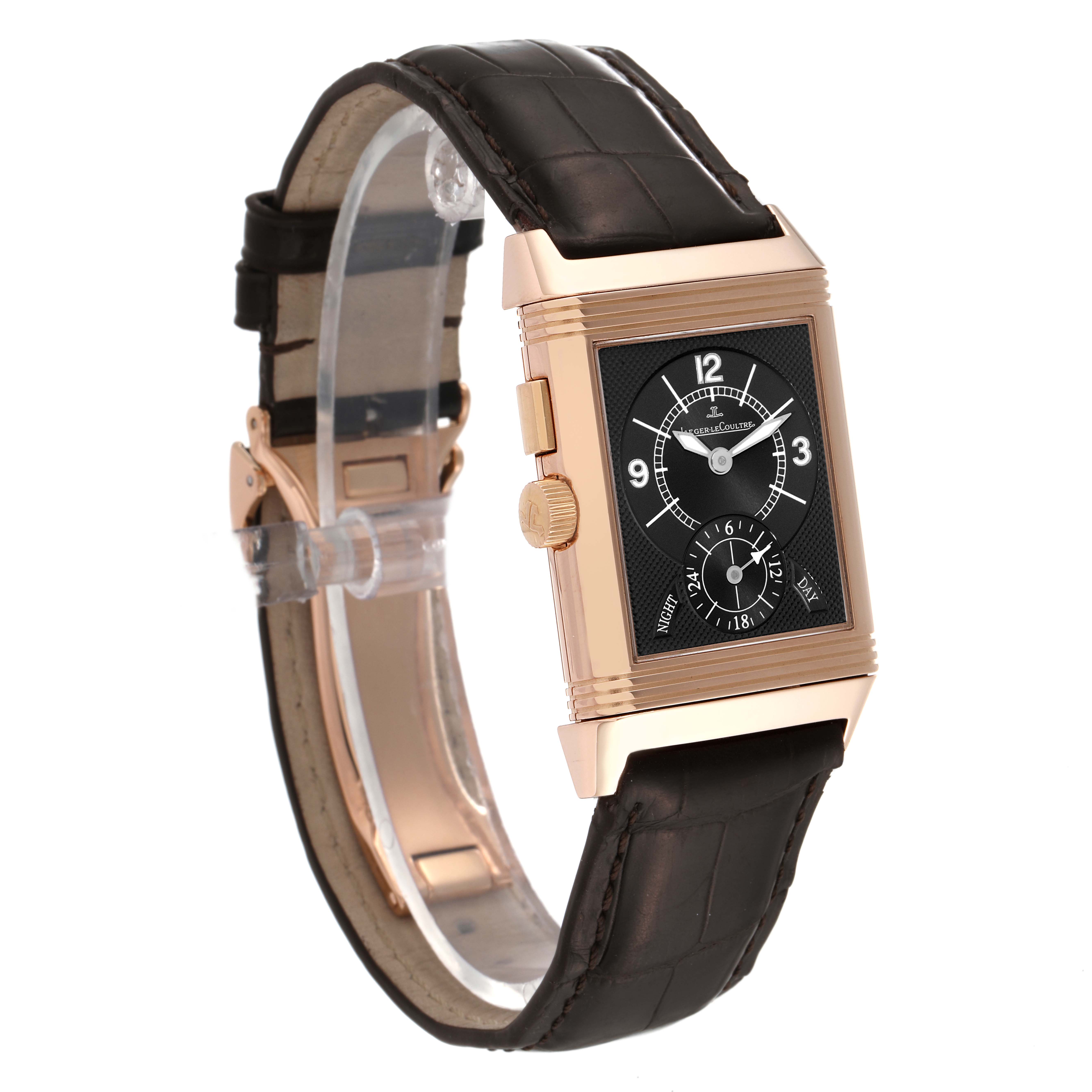 This Jaeger-LeCoultre Reverso watch is shown at a slight angle, highlighting the face, crown, and leather strap.