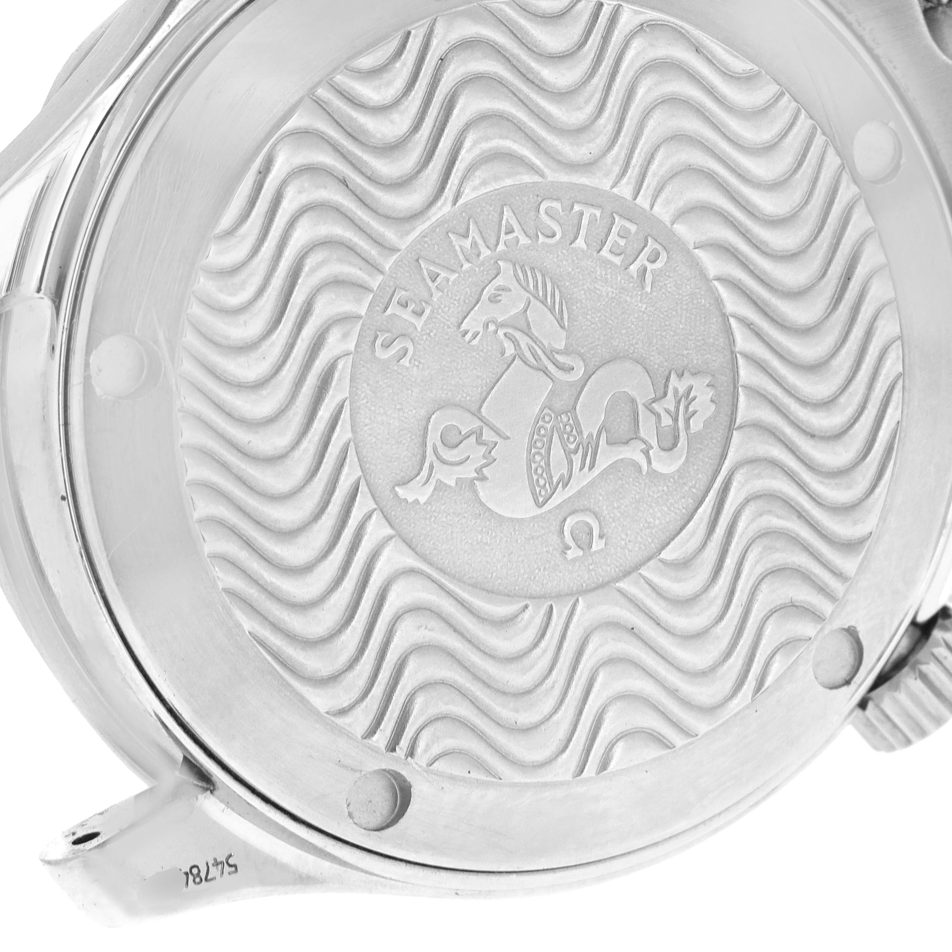 The image shows a close-up of the back casing of an Omega Seamaster 2561.80.00 Men
s Stainless Steel Blue Dial 2561.80.00 Men
s Stainless Steel Blue Dial watch, featuring the iconic wavy design and seahorse emblem.