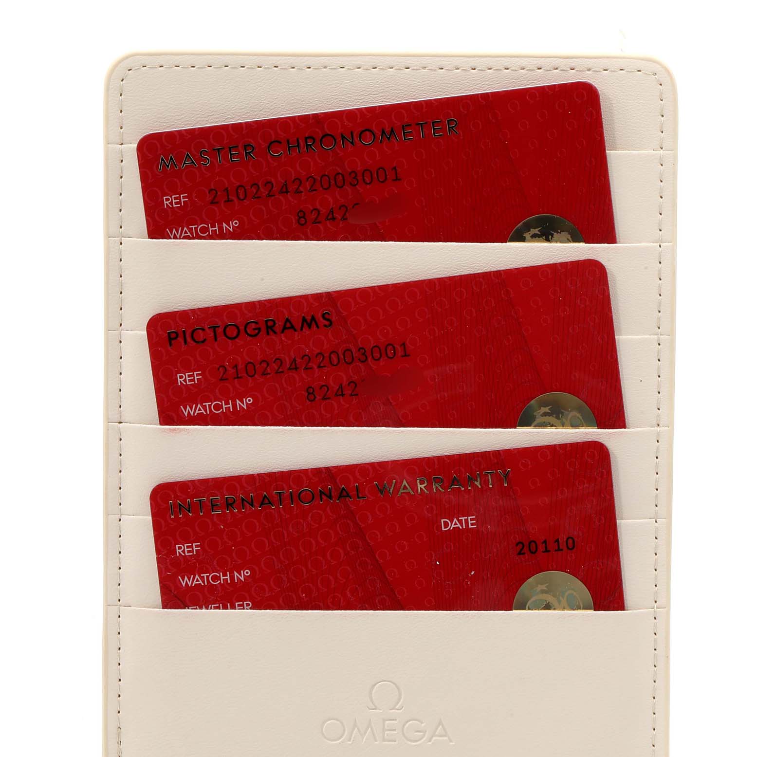 The image shows warranty and certification cards for the Omega Seamaster 210.22.42.20.03.001 Men's Steel and Gold (two tone) Blue Dial 210.22.42.20.03.001 Men's Steel and Gold (two tone) Blue Dial model in a white card holder.