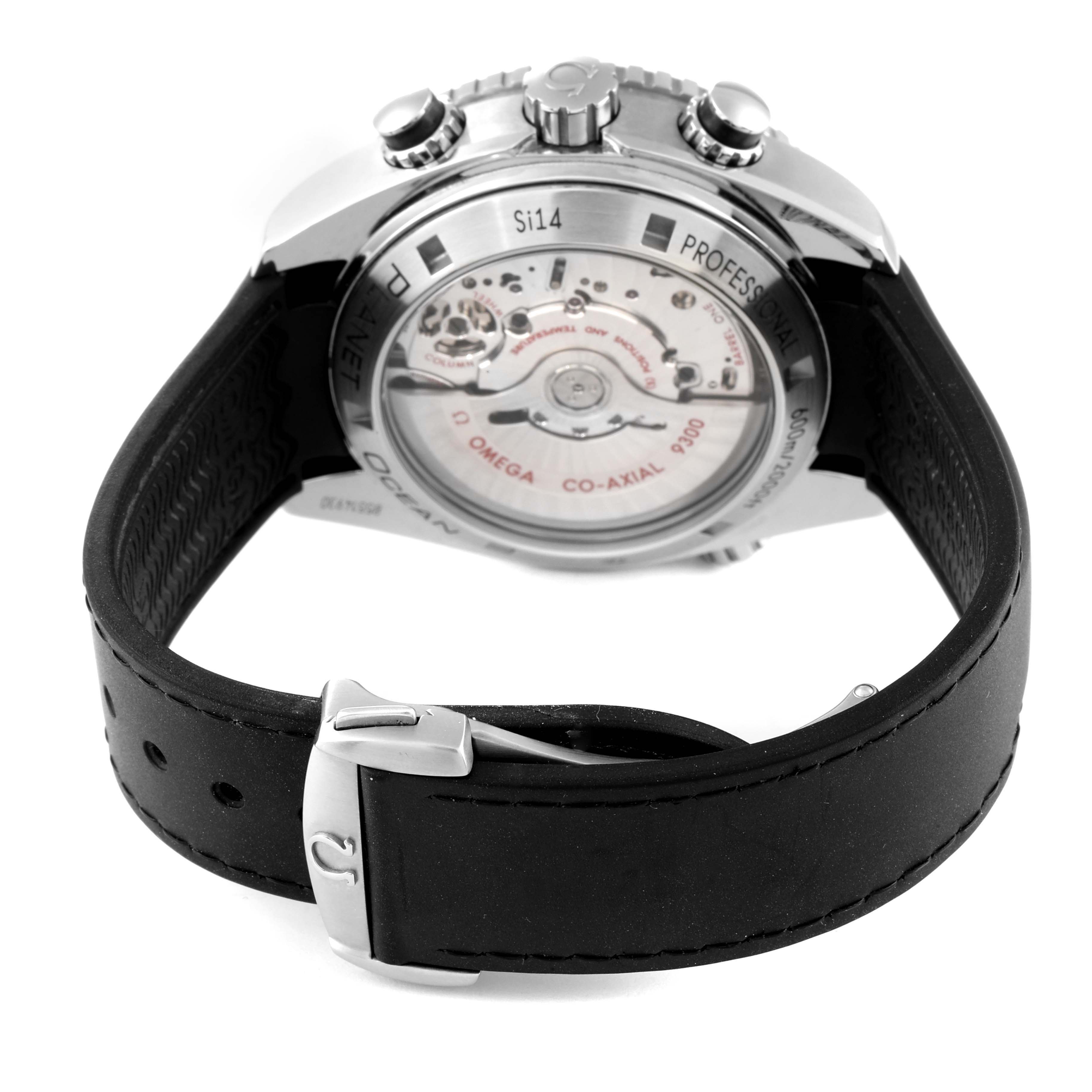 This image shows the back view of the Omega Planet Ocean 232.32.46.51.01.003 Men
s Stainless Steel Black Dial 232.32.46.51.01.003 Men
s Stainless Steel Black Dial watch, displaying its movement mechanism and black strap with buckle.