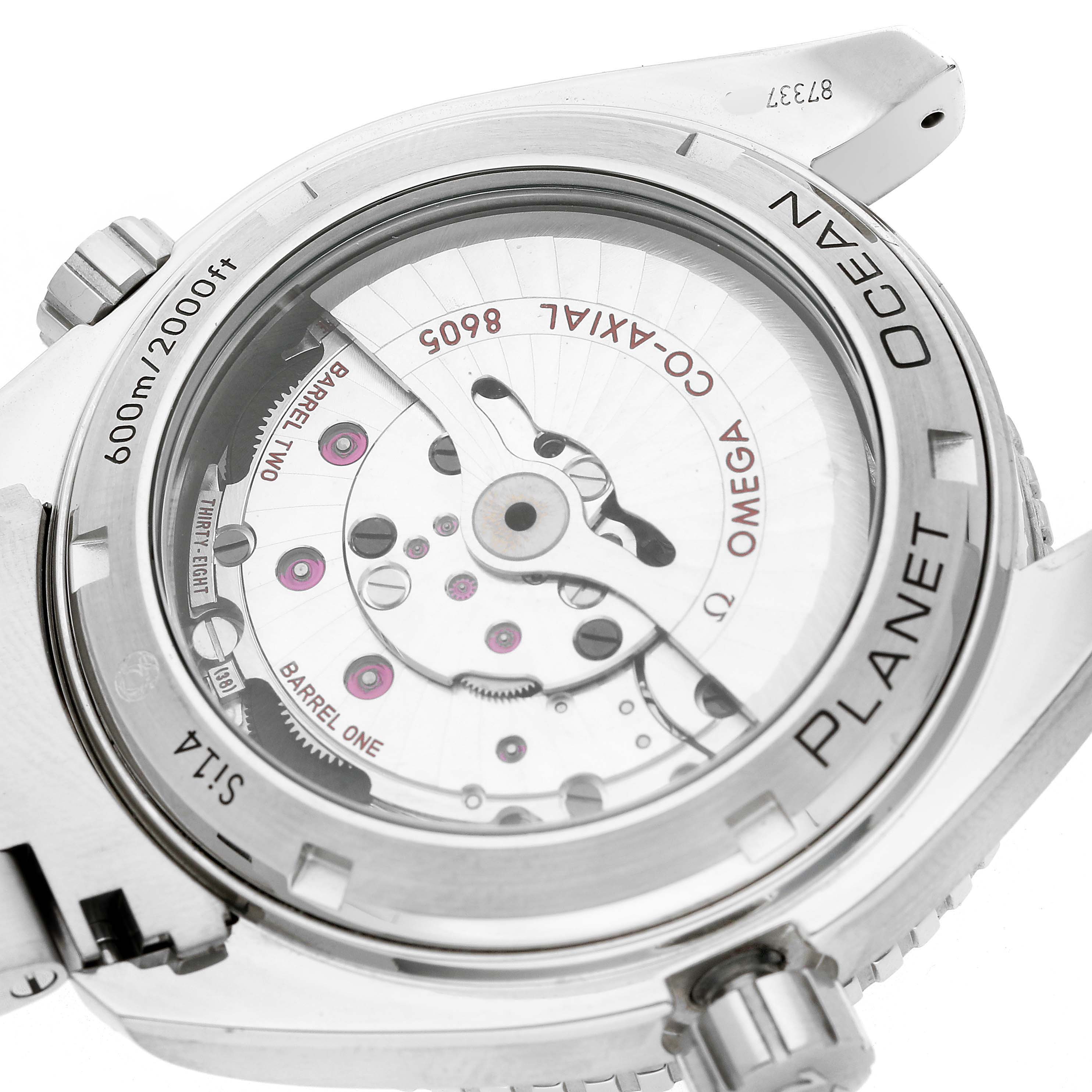 The image shows the Omega Planet Ocean 232.30.44.22.01.002 Men's Stainless Steel Black Dial watch from a rear angle, highlighting its transparent case back and internal movement.