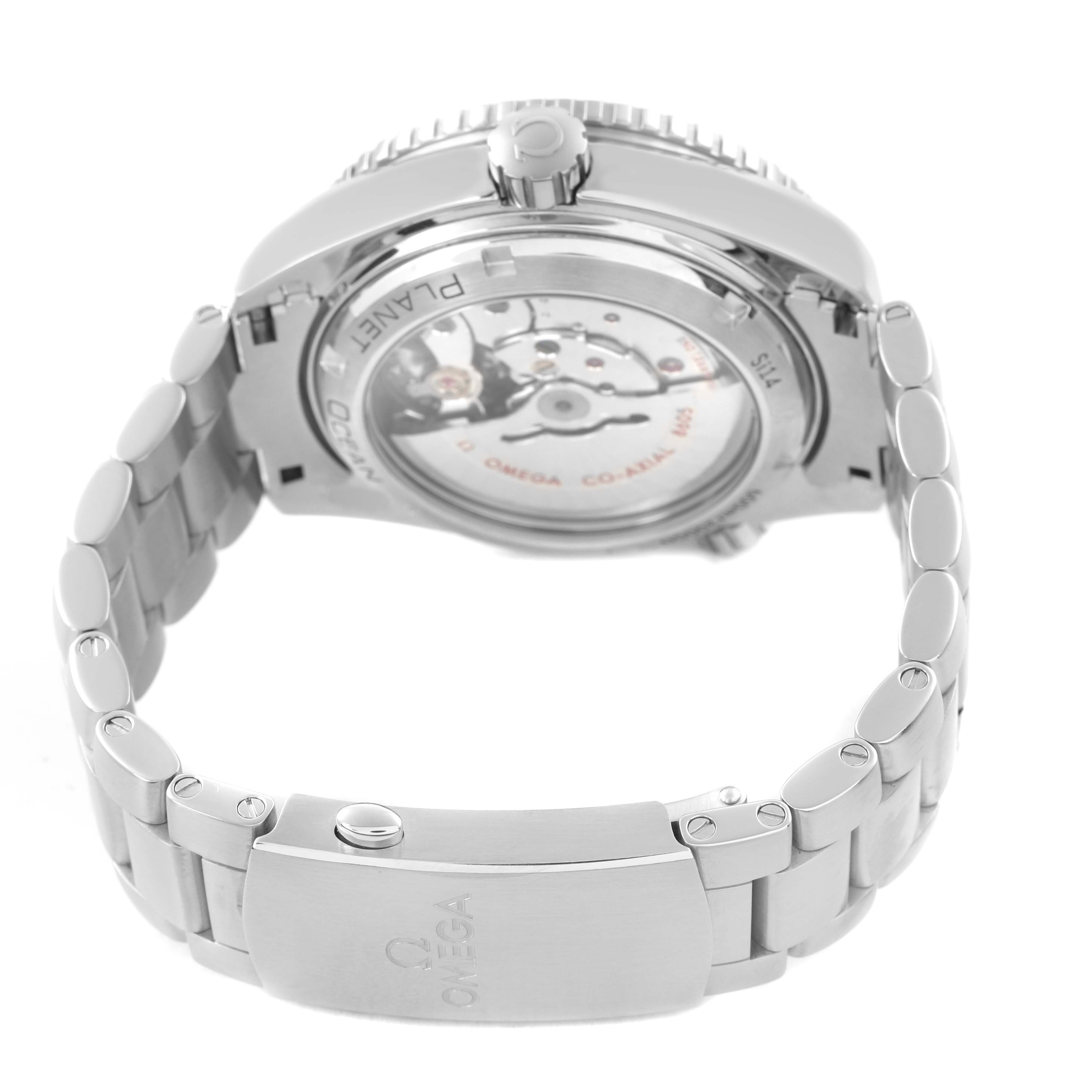 The image shows an Omega Planet Ocean 232.30.44.22.01.002 Men's Stainless Steel Black Dial watch from a rear angle, highlighting the open case back and bracelet clasp.