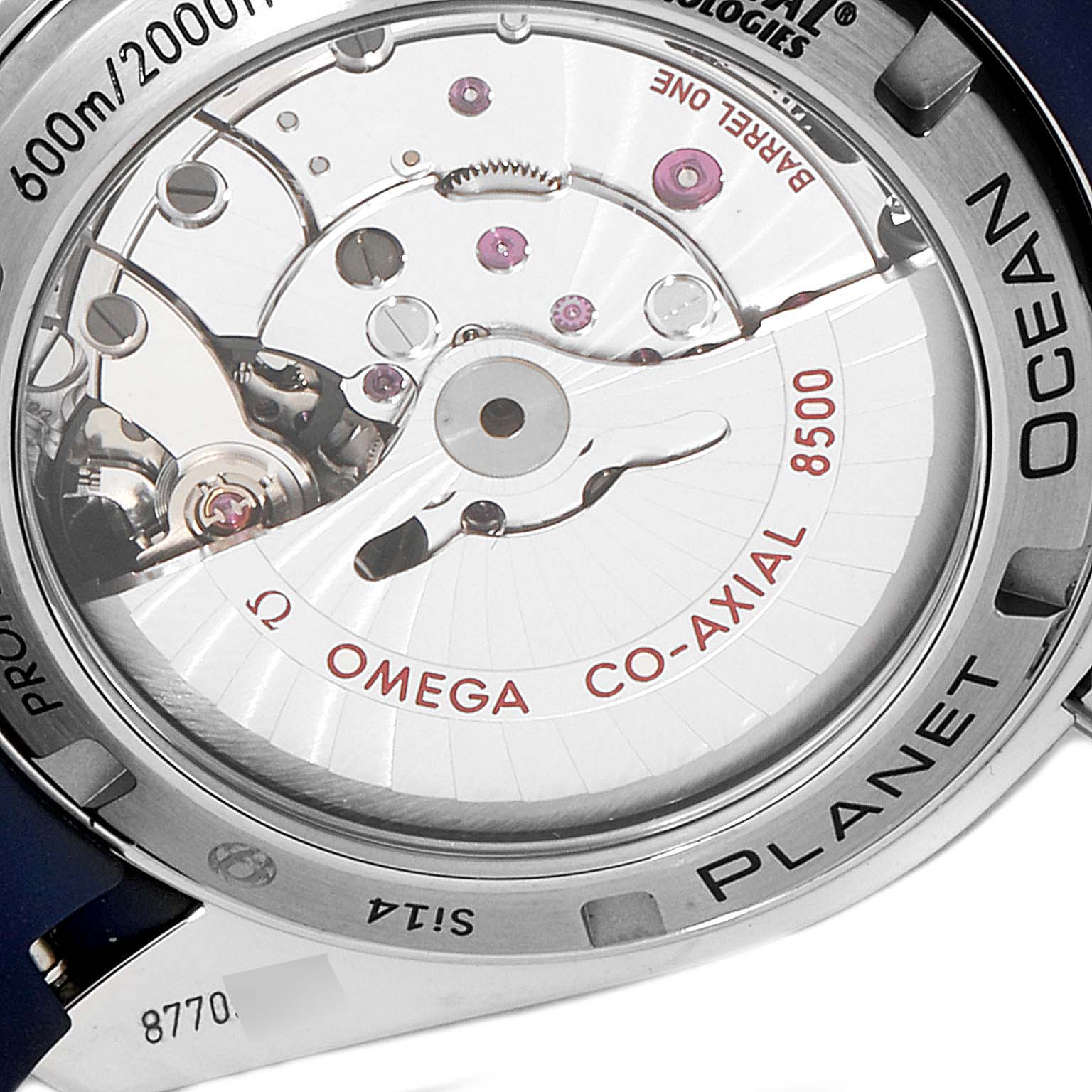 The image shows the back of the Omega Planet Ocean 232.92.42.21.03.001 Men's Stainless Steel Blue Dial 232.92.42.21.03.001 Men's Stainless Steel Blue Dial watch, highlighting its co-axial movement and intricate inner mechanisms.
