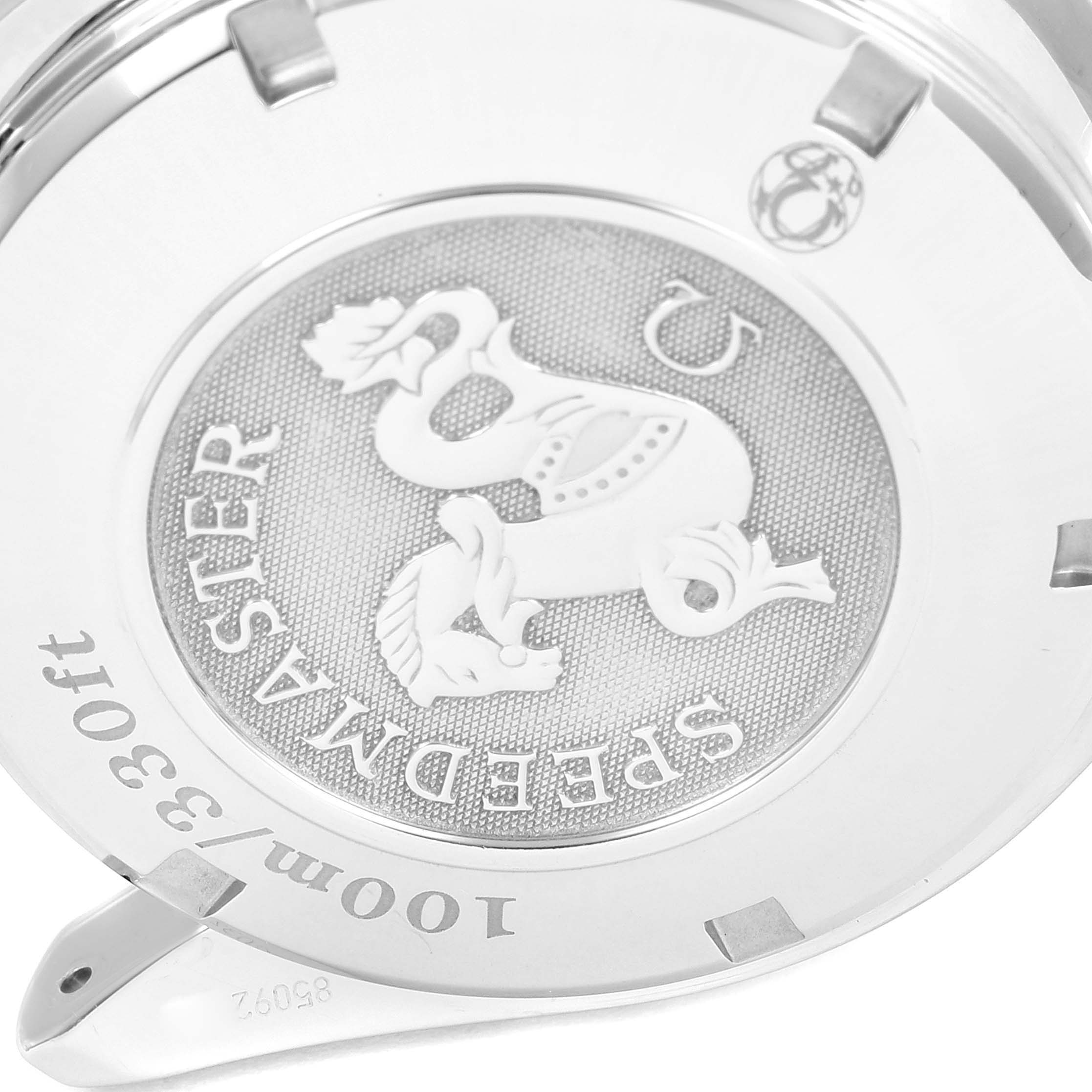 The image shows the case back of an Omega Speedmaster 323.30.40.40.04.001 Men's Stainless Steel White Dial 323.30.40.40.04.001 Men's Stainless Steel White Dial watch, highlighting the embossed logo and water resistance rating.