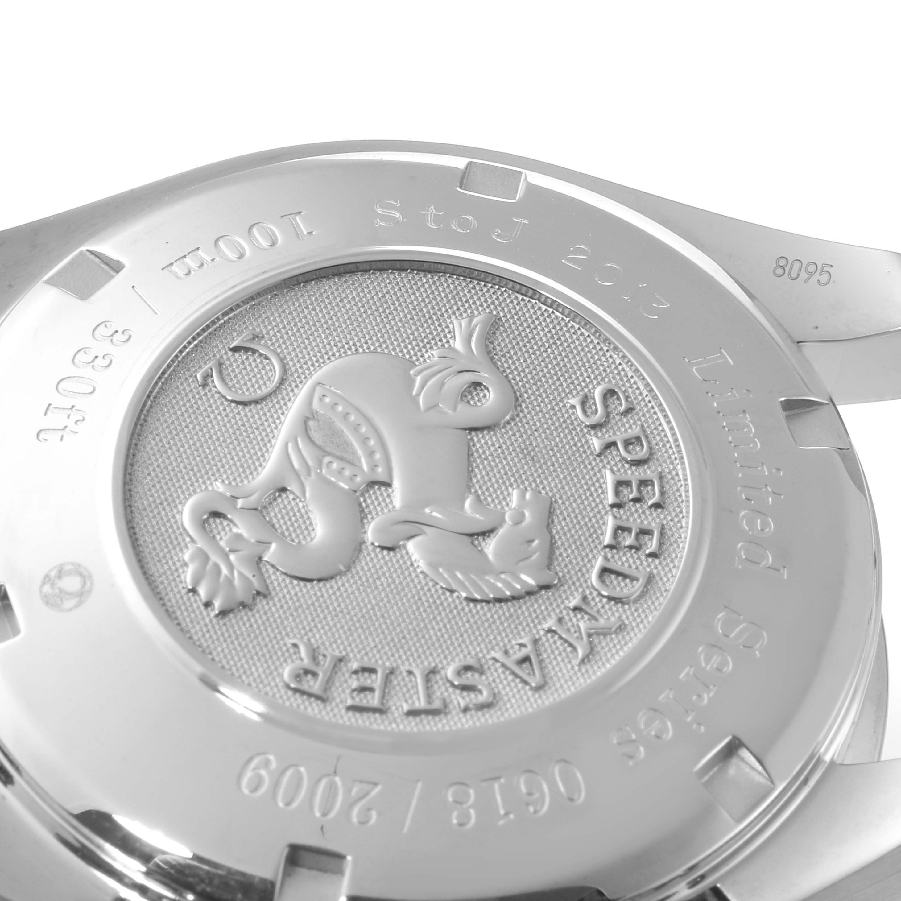 The image shows the case back of an Omega Speedmaster 323.30.40.40.02.001 Men's Stainless Steel White Dial 323.30.40.40.02.001 Men's Stainless Steel White Dial watch, highlighting the embossed design and engraved text.