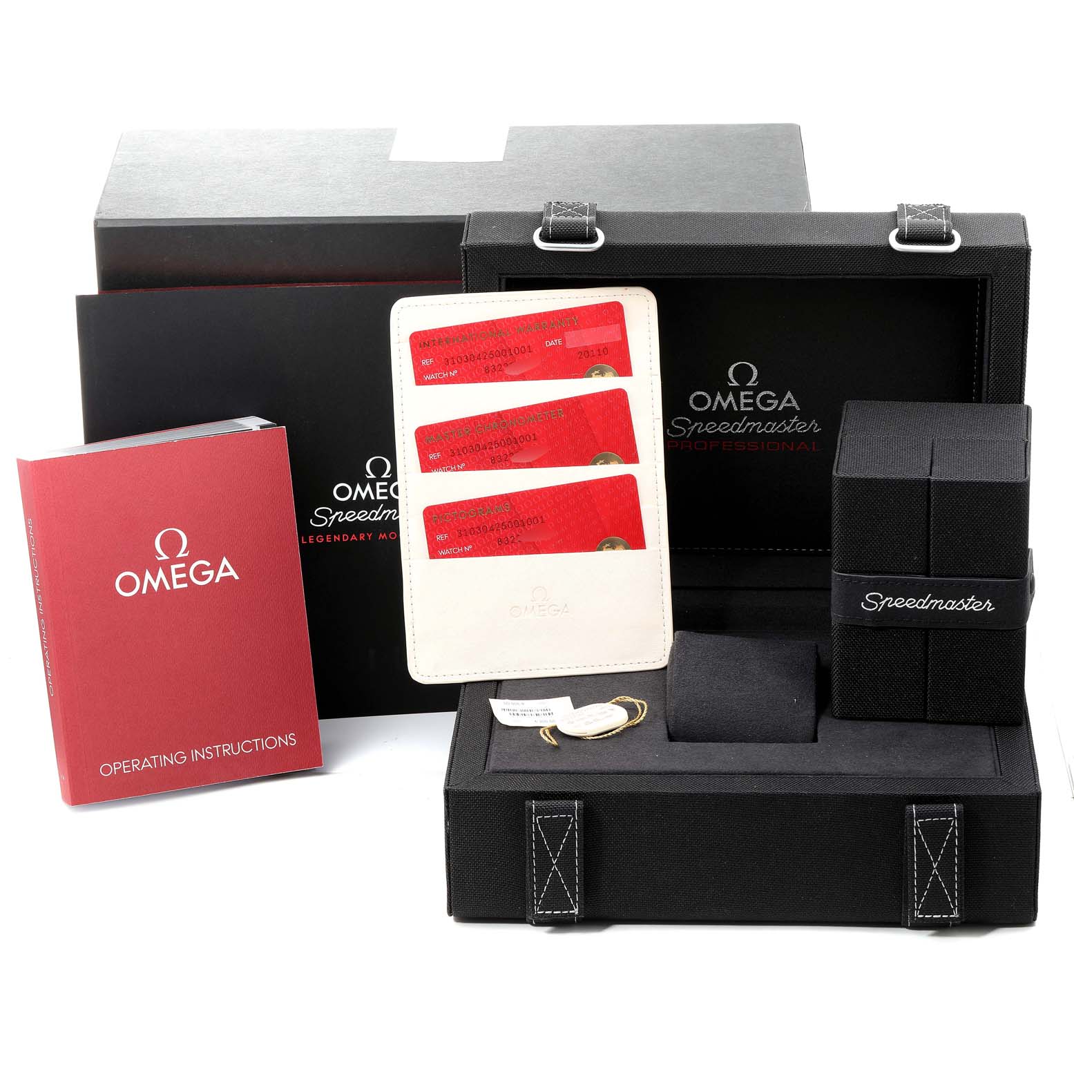 The image shows an Omega Speedmaster 310.30.42.50.01.001 Men's Stainless Steel Black Dial 310.30.42.50.01.001 Men's Stainless Steel Black Dial watch package including boxes, cards, a booklet, and a keychain, viewed from an angle.