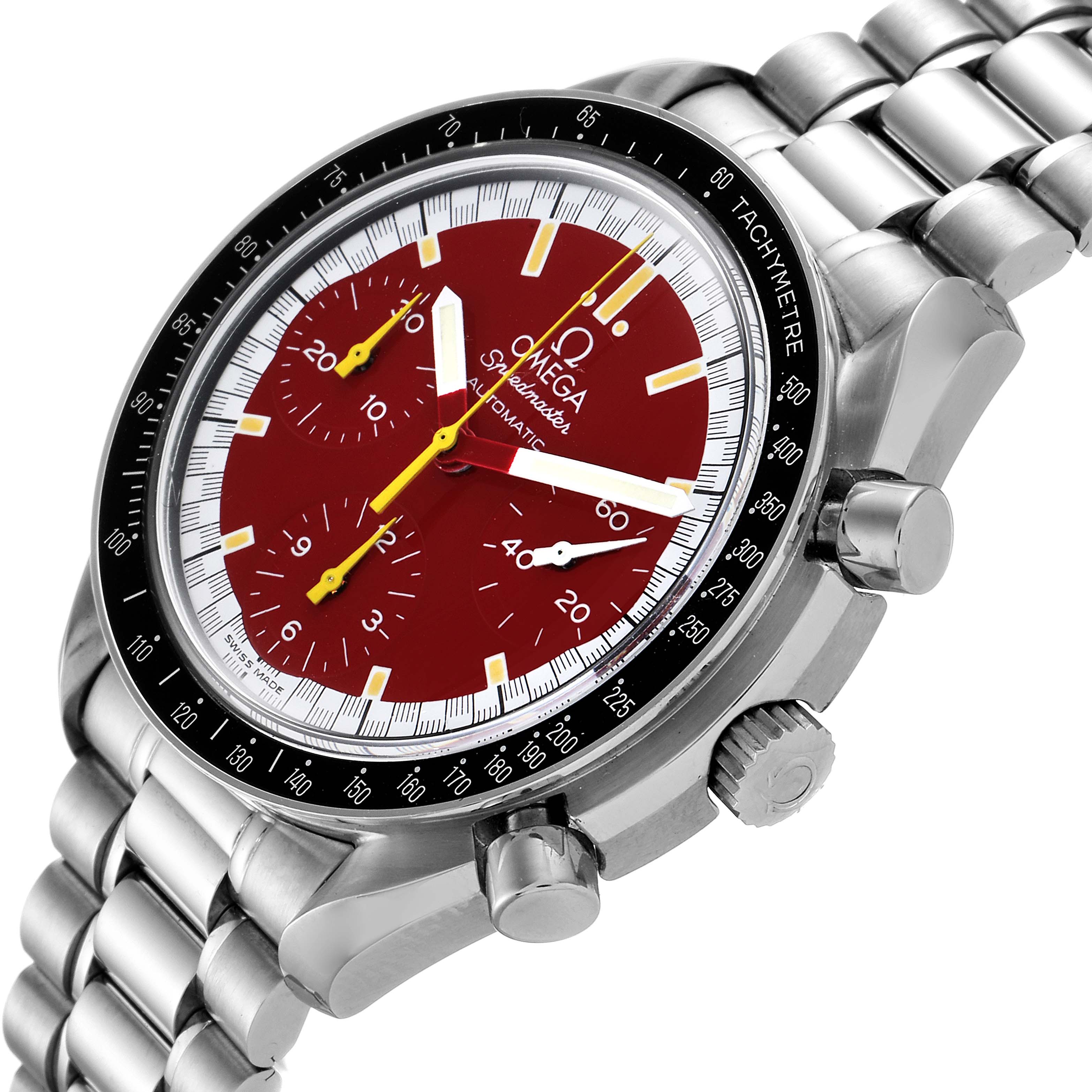 The image shows an Omega Speedmaster 3510.61.00 Men's Stainless Steel Red Dial 3510.61.00 Men's Stainless Steel Red Dial watch at an angled side view, highlighting the face, bezel, crown, and bracelet.