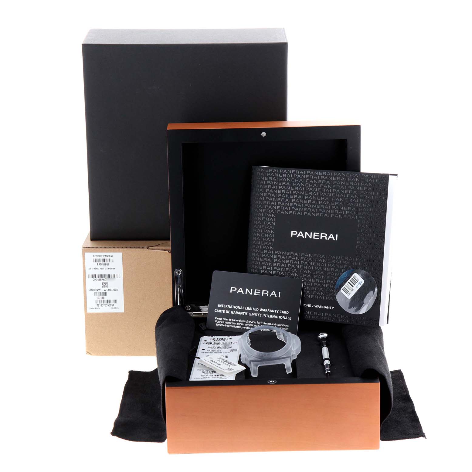 The image shows the packaging and accessories for the Panerai Luminor PAM01661 Men's Stainless Steel Black Dial PAM01661 Men's Stainless Steel Black Dial model, including manuals, a warranty card, tools, and a watch case holder.