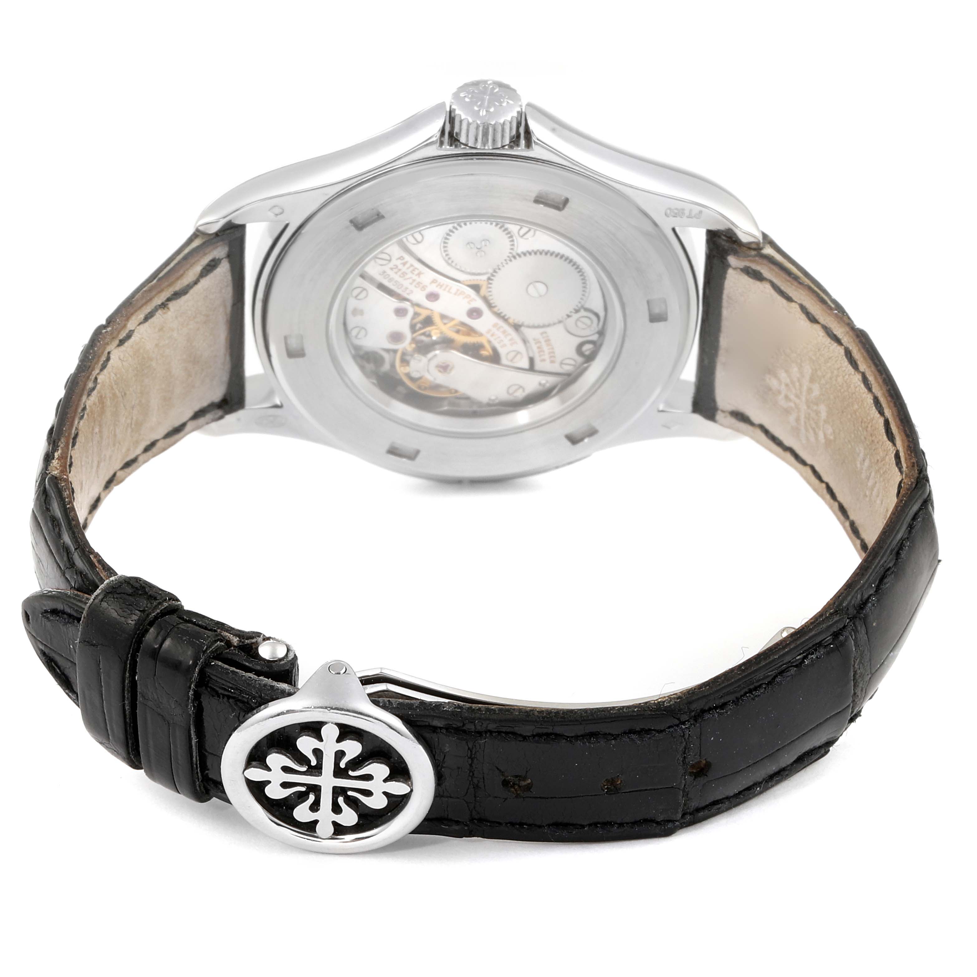 The image shows the back view of the Patek Philippe Calatrava 5134P Men's Platinum Silver Dial 5134P Men's Platinum Silver Dial watch with a clear view of its mechanism and leather strap clasp.