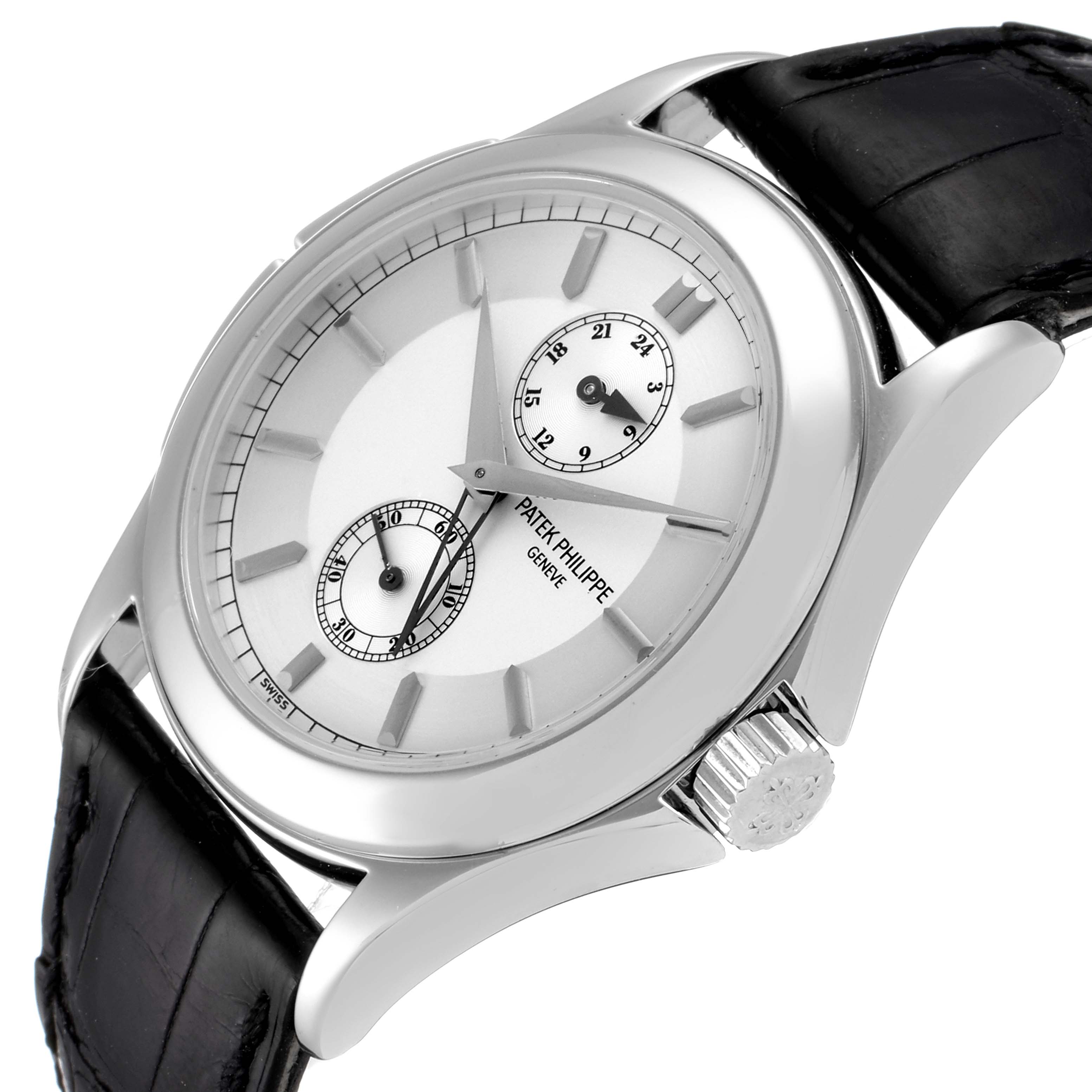 This image shows a Patek Philippe Calatrava 5134P Men's Platinum Silver Dial 5134P Men's Platinum Silver Dial watch at a slight angle, highlighting the dial, case, and leather strap.