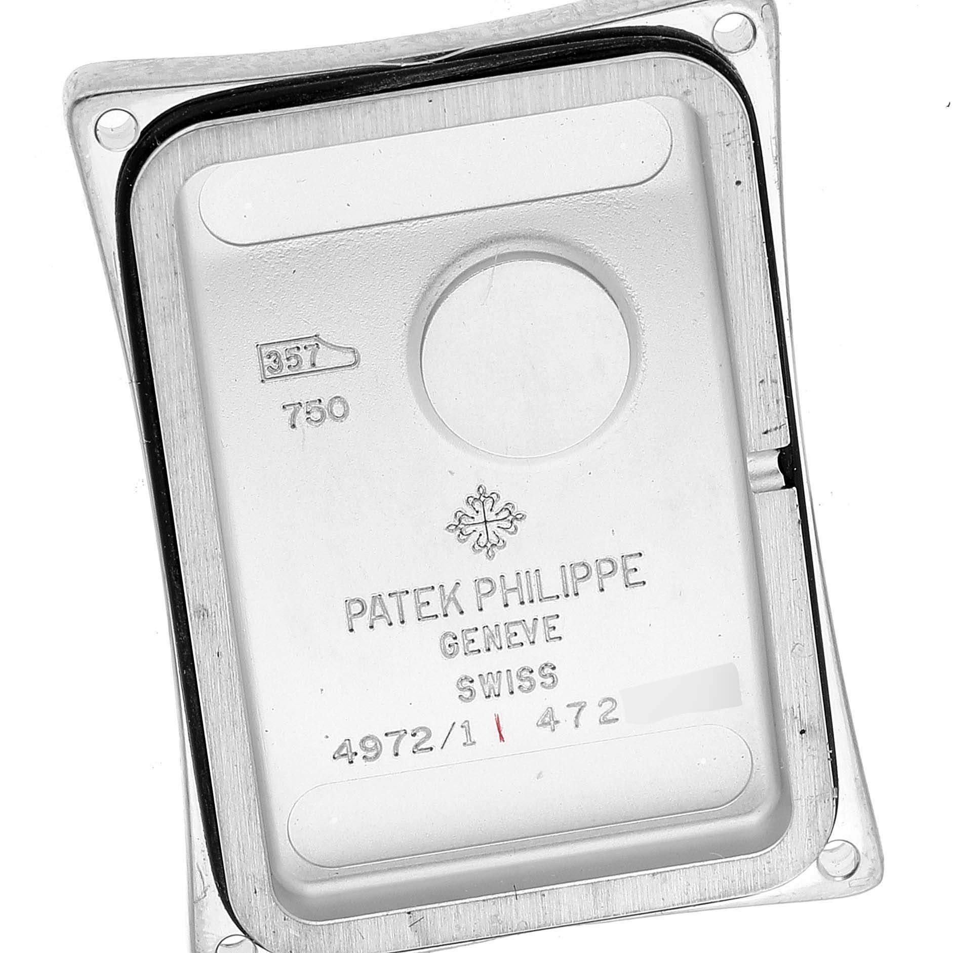 The image shows the back panel of a Patek Philippe Gondolo 4972/1G-001 Women's White Gold Mother of Pearl Dial 4972/1G-001 Women's White Gold Mother of Pearl Dial watch, with engravings indicating model and brand details.