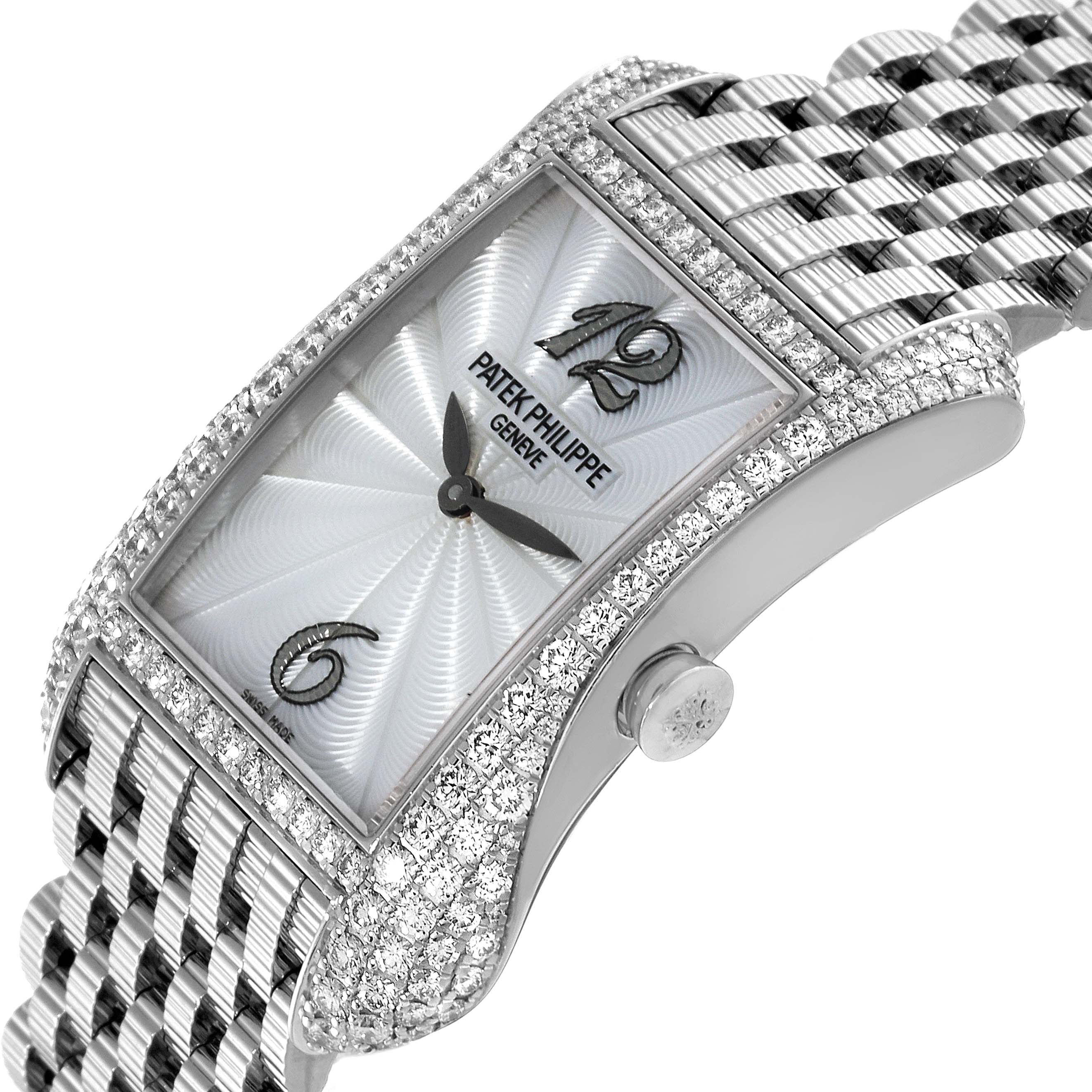 The image shows a side-angle view of the Patek Philippe Gondolo 4972/1G-001 Women's White Gold Mother of Pearl Dial 4972/1G-001 Women's White Gold Mother of Pearl Dial watch, highlighting the watch face, crown, and diamond-studded bracelet.