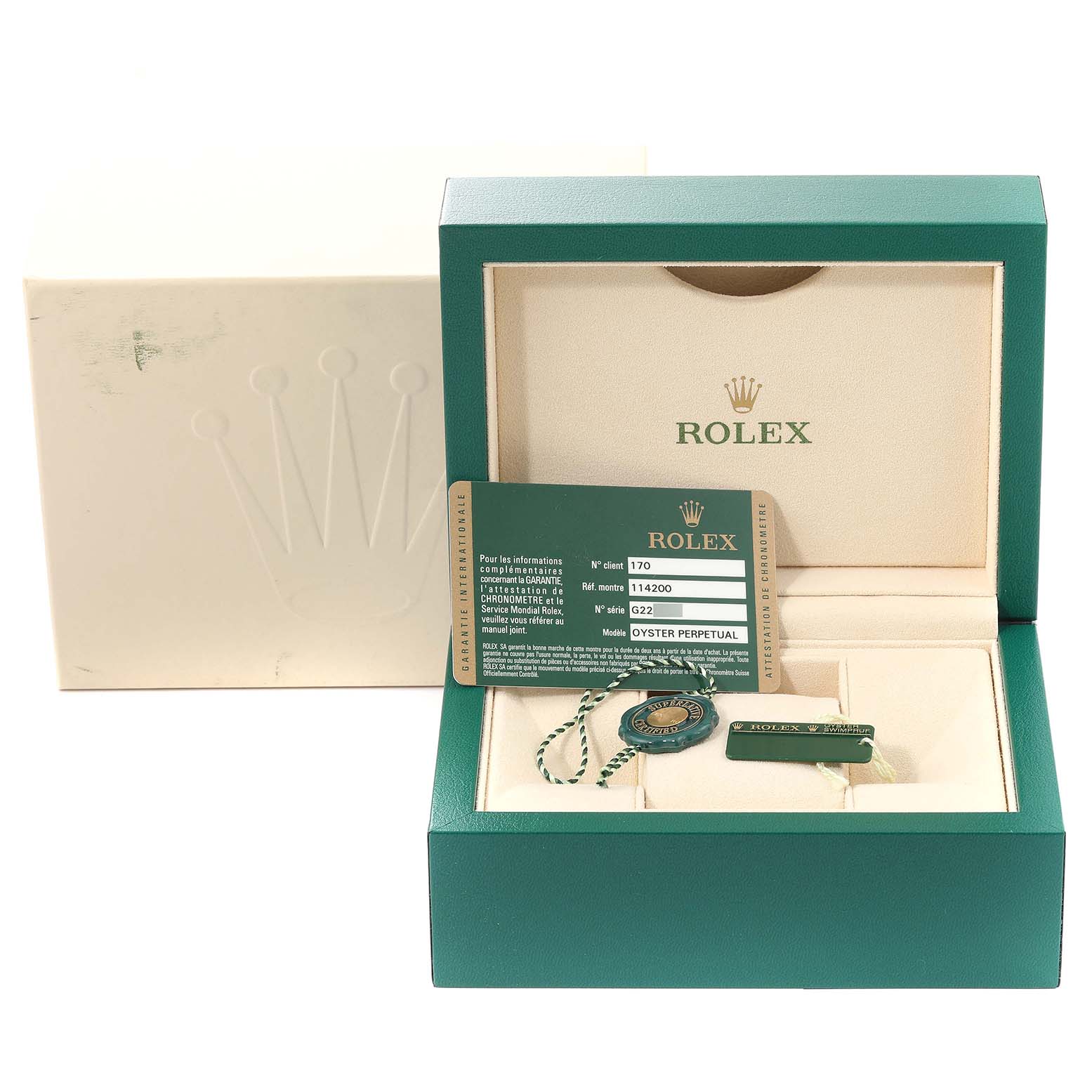 The image shows the packaging, a certificate card, and accessories for the Rolex Air-King 114200 Men's Stainless Steel Blue Dial 114200 Men's Stainless Steel Blue Dial watch from a front angle.