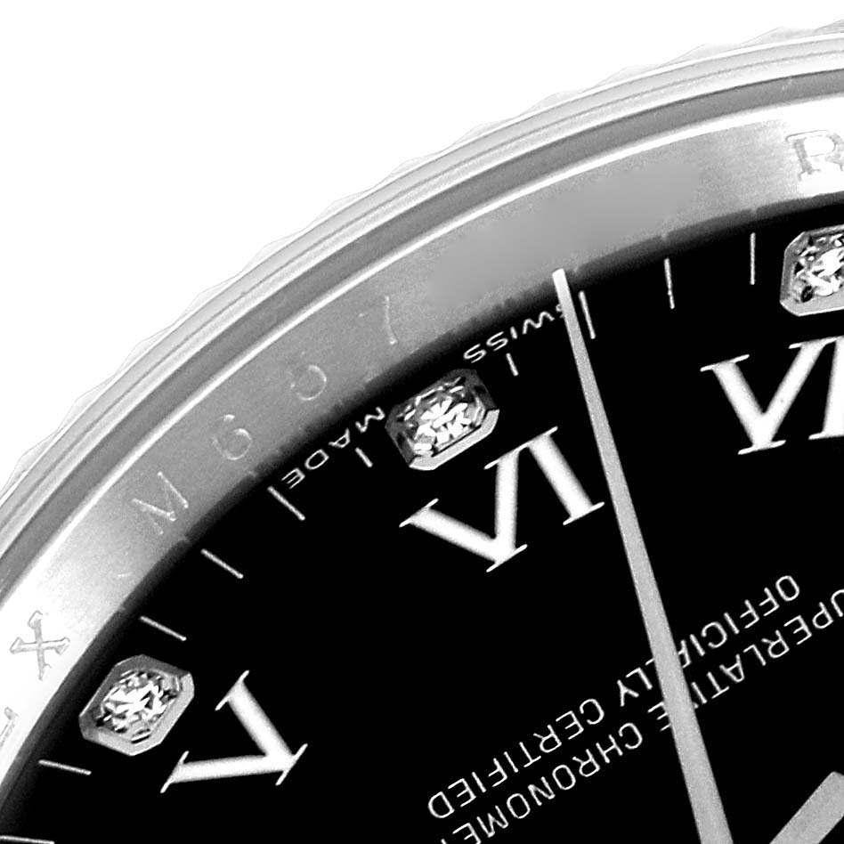A close-up angle of the Rolex Air-King 114234 Men's Stainless Steel Black Dial 114234 Men's Stainless Steel Black Dial watch showing part of the bezel, dial, and indices.