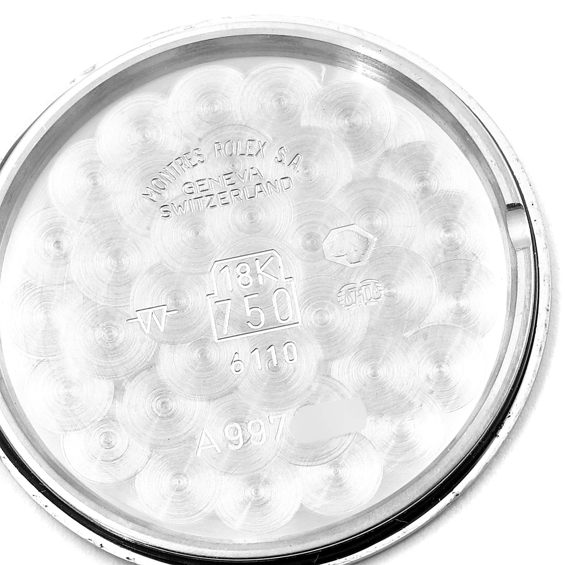 This is the inner side of the case back of a Rolex Cellini 6110 Women's White Gold Silver Dial 6110 Women's White Gold Silver Dial watch.