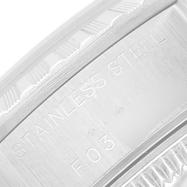 This close-up image shows the stainless steel case back of a Rolex Datejust 79240 Women's Stainless Steel Black Dial 79240 Women's Stainless Steel Black Dial watch.