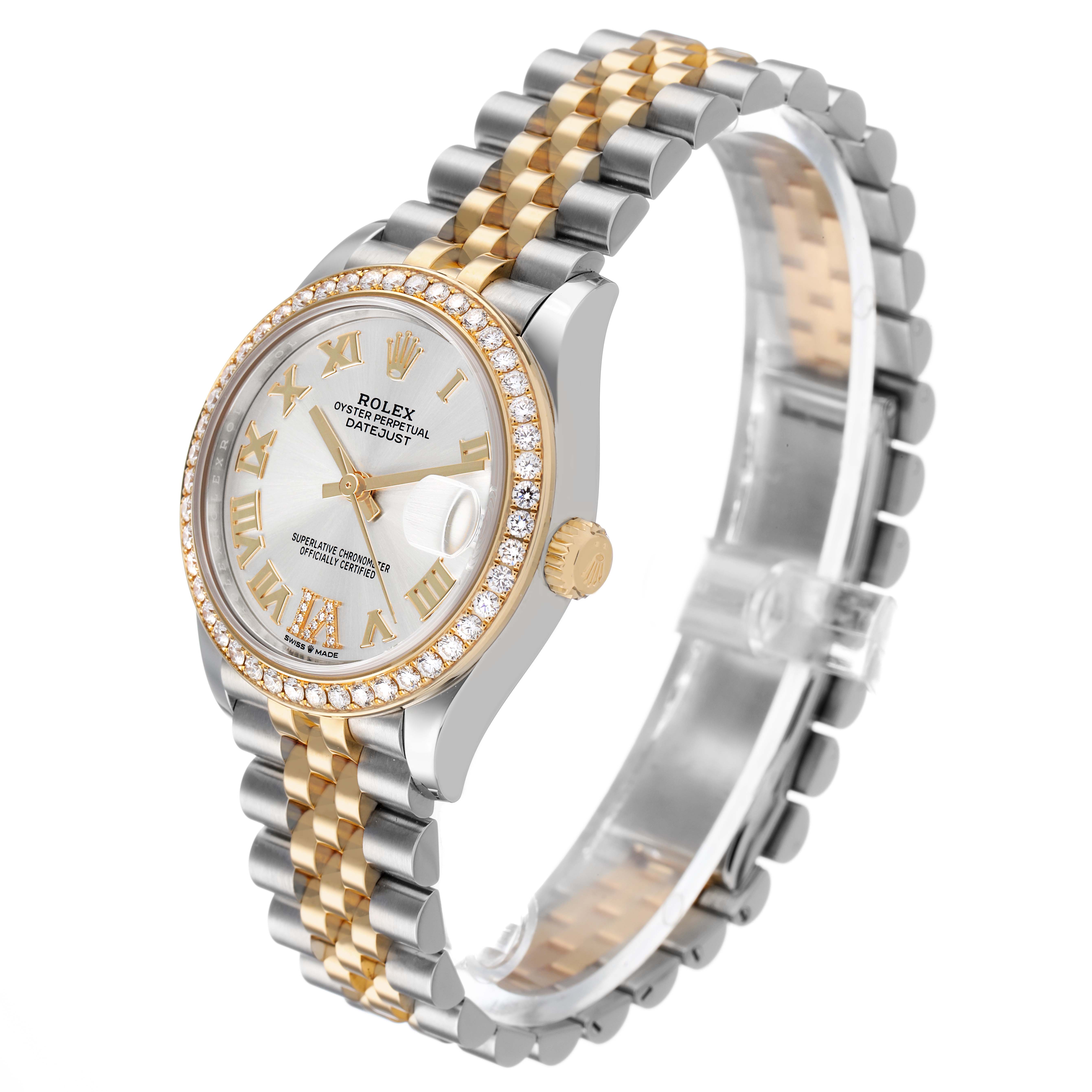 The Rolex Mid-Size M278383RBR-0004 Women's Steel and Gold (two tone) Silver Dial Datejust watch is shown at a side angle, displaying its two-tone bracelet, diamond bezel, and Roman numeral dial.