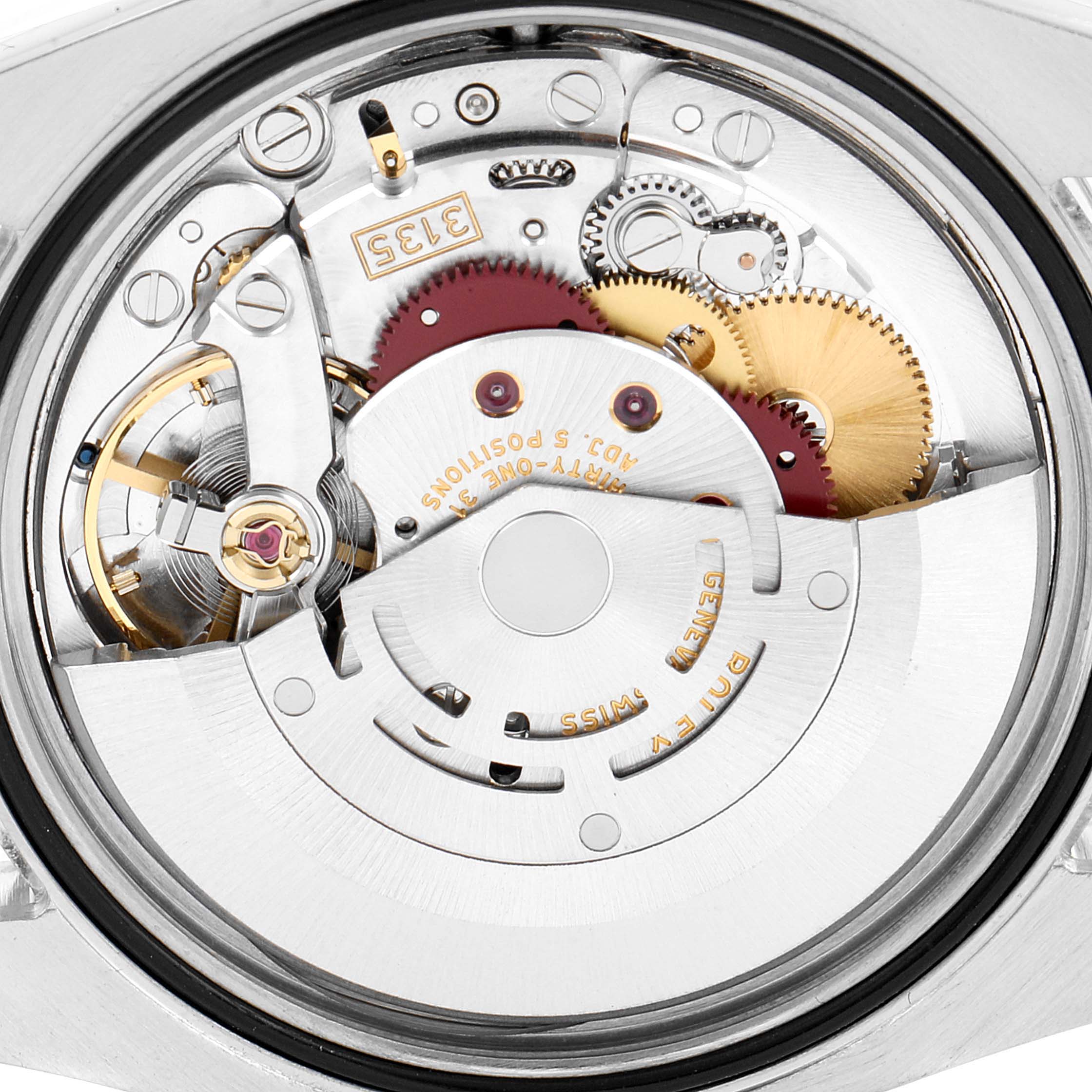 The image shows the internal mechanism of the Rolex Datejust 116200 Men
s Stainless Steel Black Dial 116200 Men
s Stainless Steel Black Dial watch from an angled close-up view.