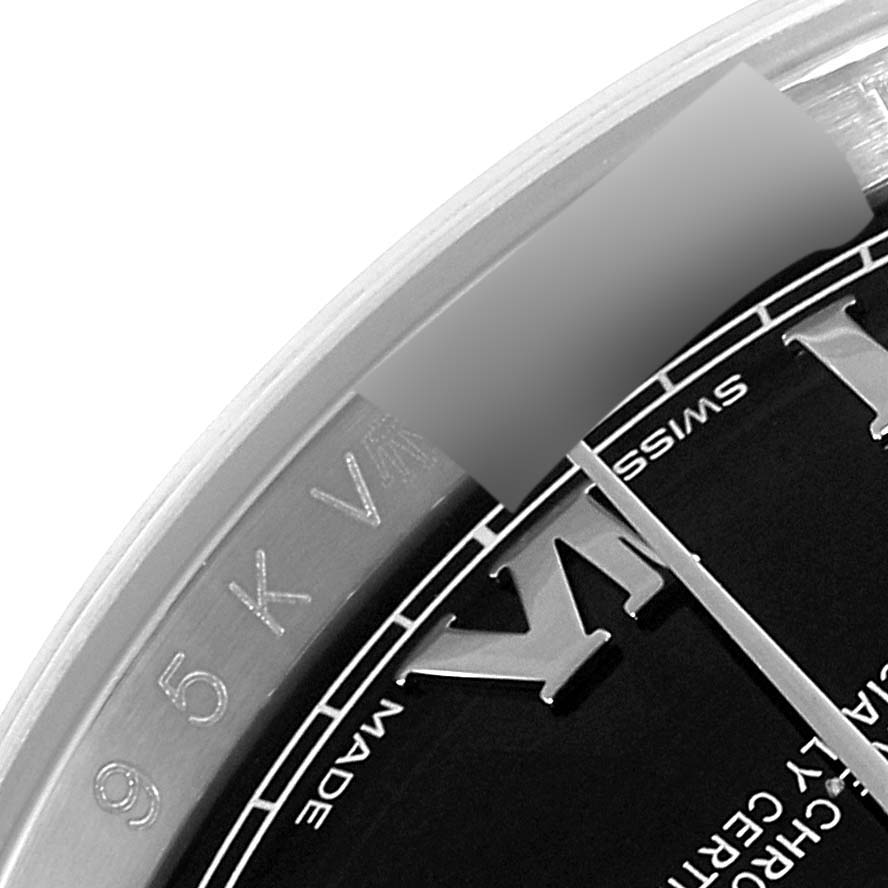 The image shows a partial close-up of the dial and bezel of a Rolex Datejust 116200 Men
s Stainless Steel Black Dial 116200 Men
s Stainless Steel Black Dial watch.