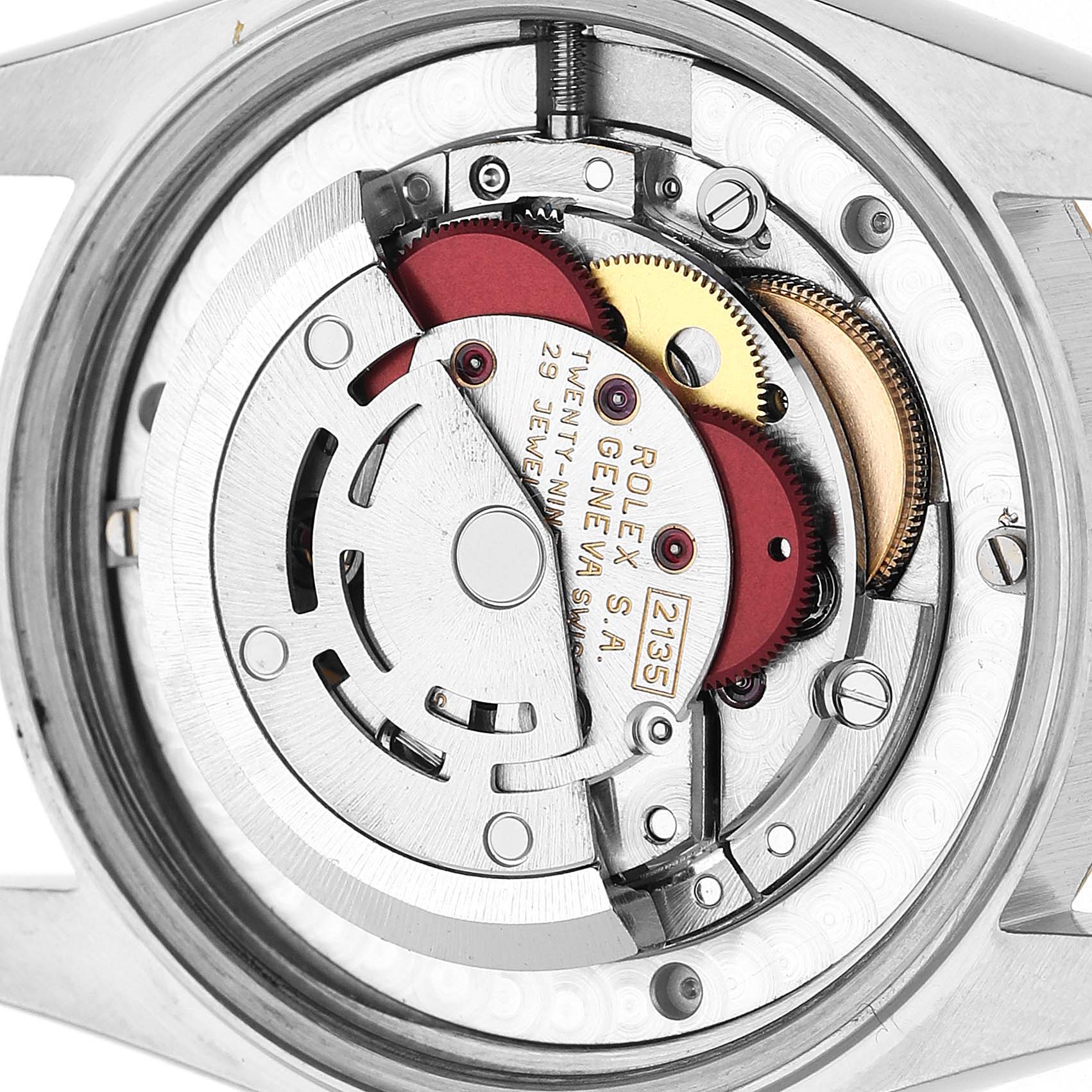 The image shows the back of a Rolex Datejust 68273 Women's Steel and Gold (two tone) Champagne Dial, exposing its intricate movement system.