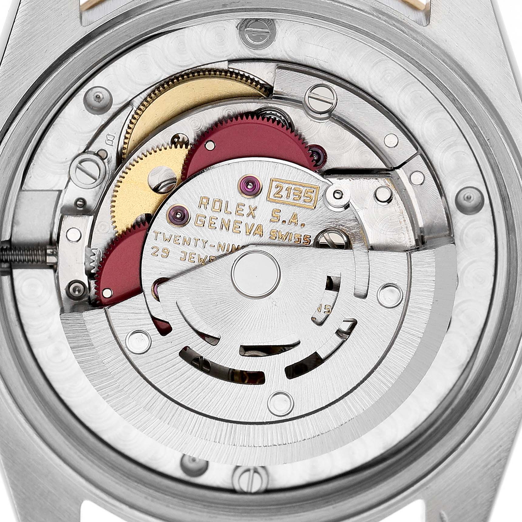 The image shows a top-down view of the Rolex Mid-Size 68273 Women's Stainless Steel White Dial watch movement, highlighting the gears and rotor.
