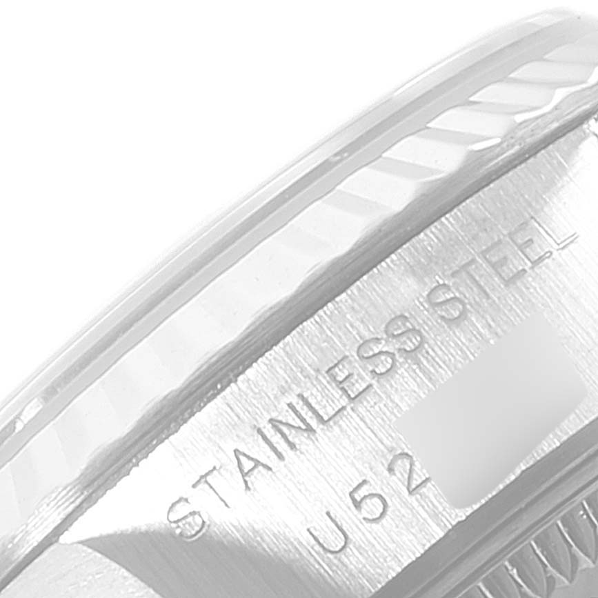 The image shows a close-up of the stainless steel side and fluted bezel of the Rolex Datejust 69174 Women's Stainless Steel Black Dial 69174 Women's Stainless Steel Black Dial watch.