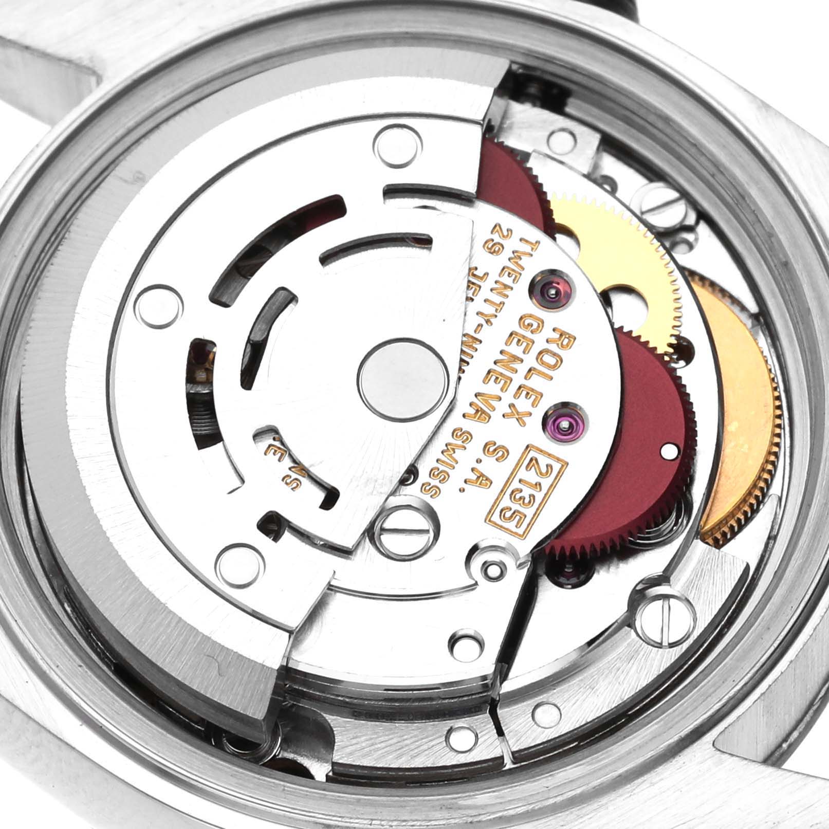 The image shows a close-up of the Rolex Datejust 69174 Women's Stainless Steel Pink Dial's movement, highlighting its intricate mechanical parts from the back.