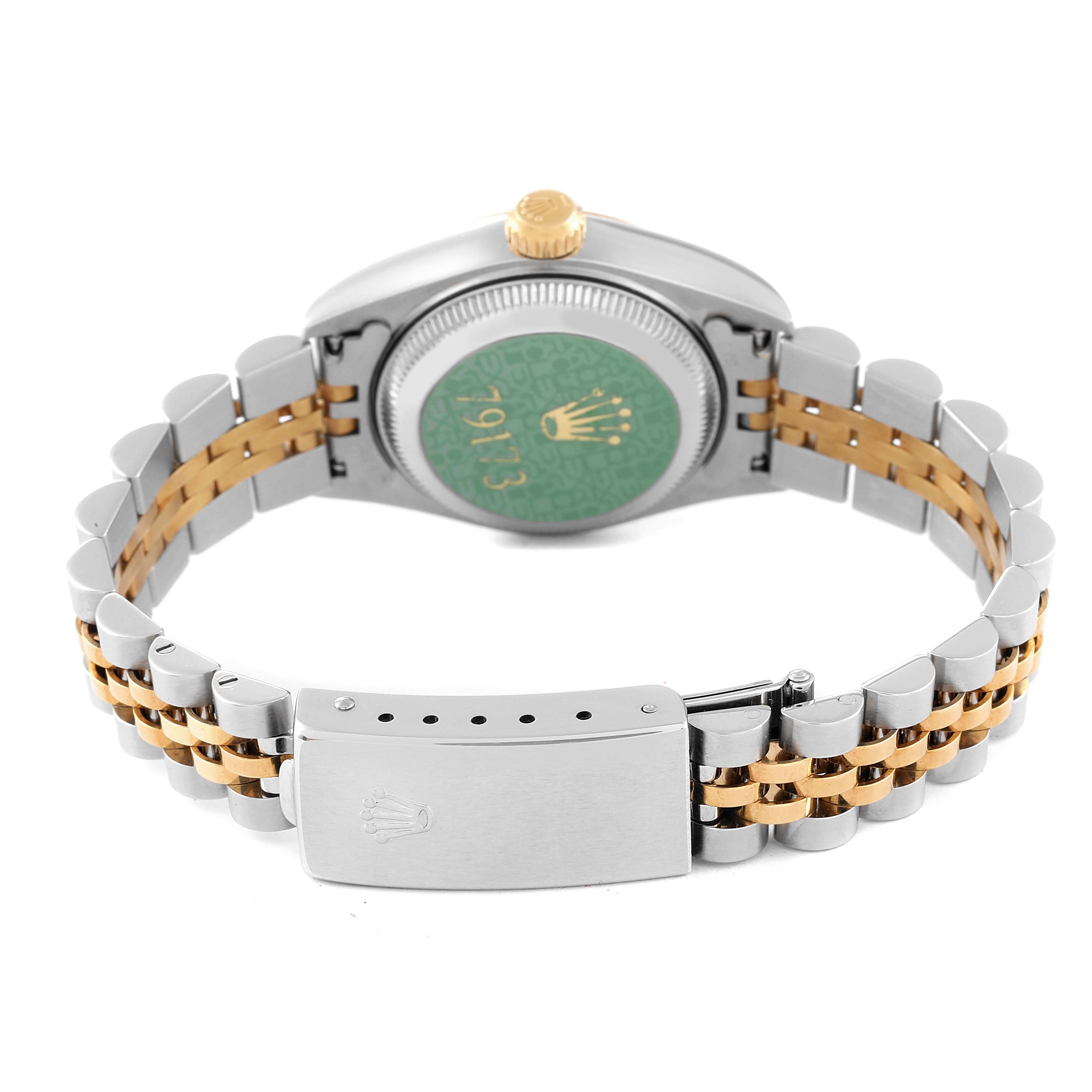 The image shows the back, clasp, and bracelet of a Rolex Datejust 79173 Women's Steel and Gold (two tone) Champagne Dial 79173 Women's Steel and Gold (two tone) Champagne Dial watch, highlighting its two-tone metal design.